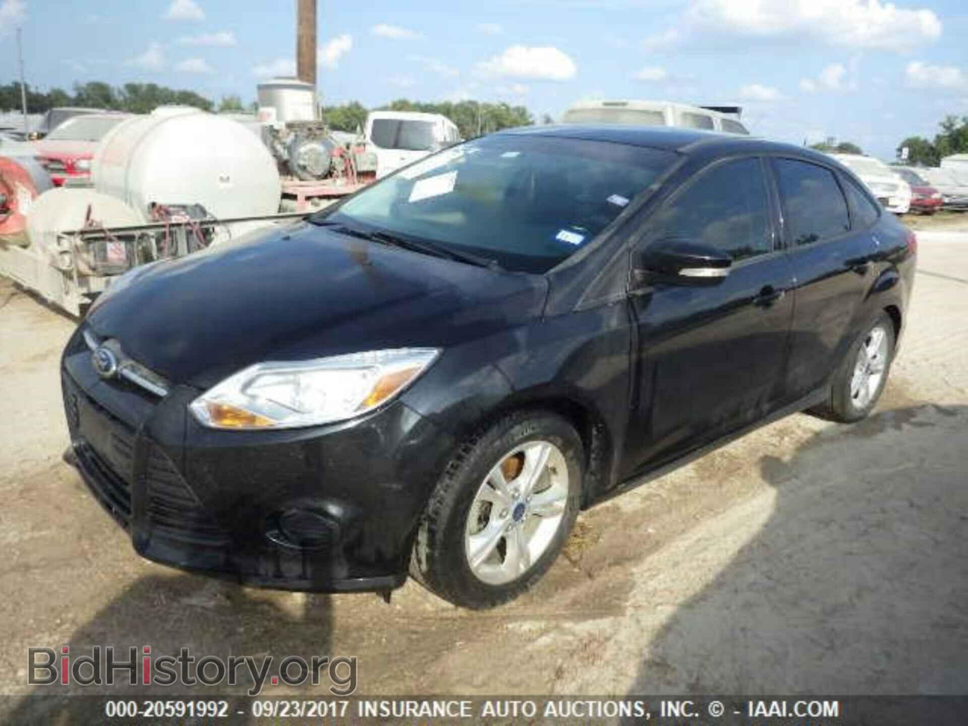 2014 Ford Focus - VIN: 1FADP3F29EL195924 - Фото 2