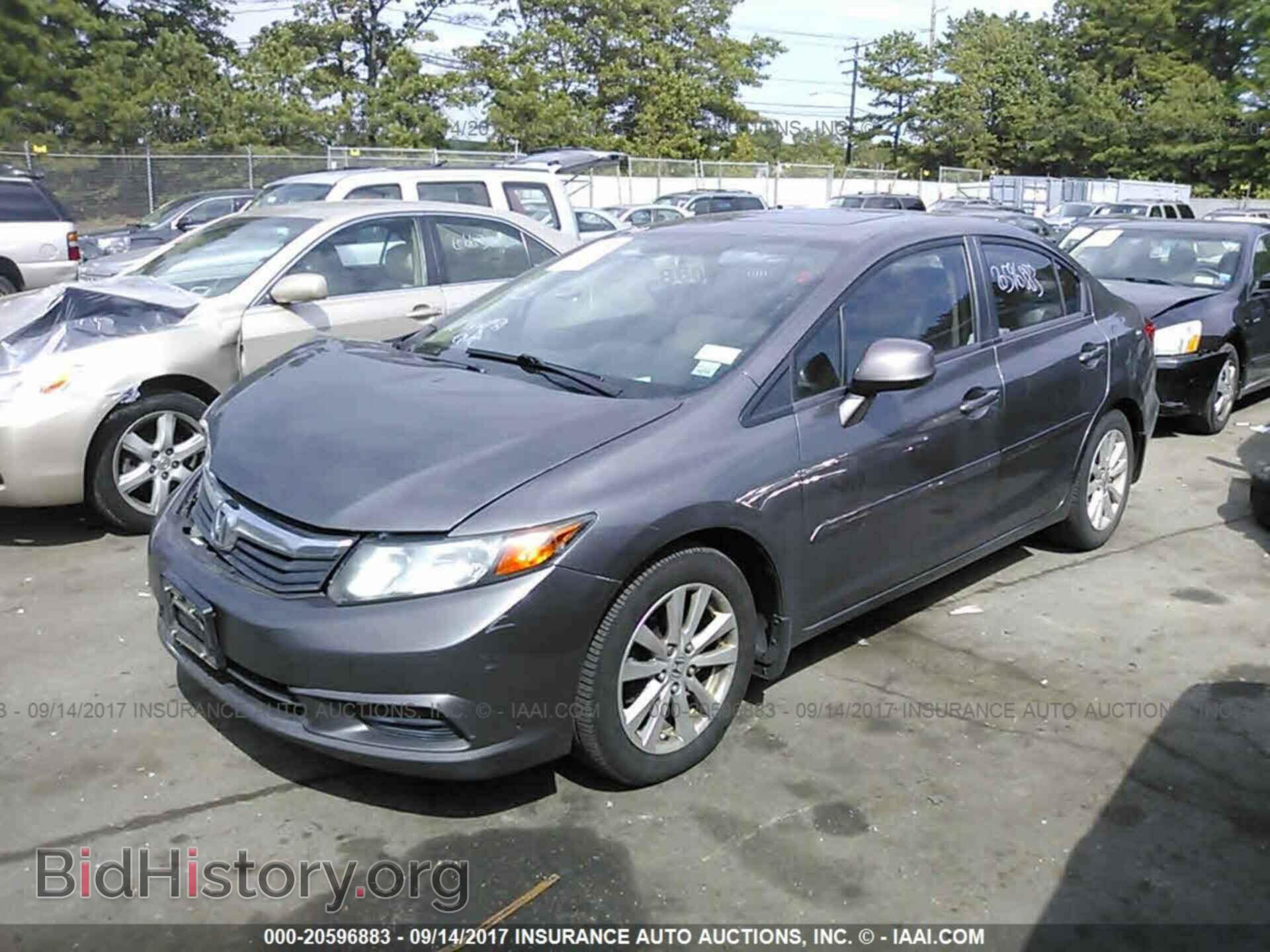 2012 Honda Civic - VIN: 19XFB2F99CE329765 - Photo 2