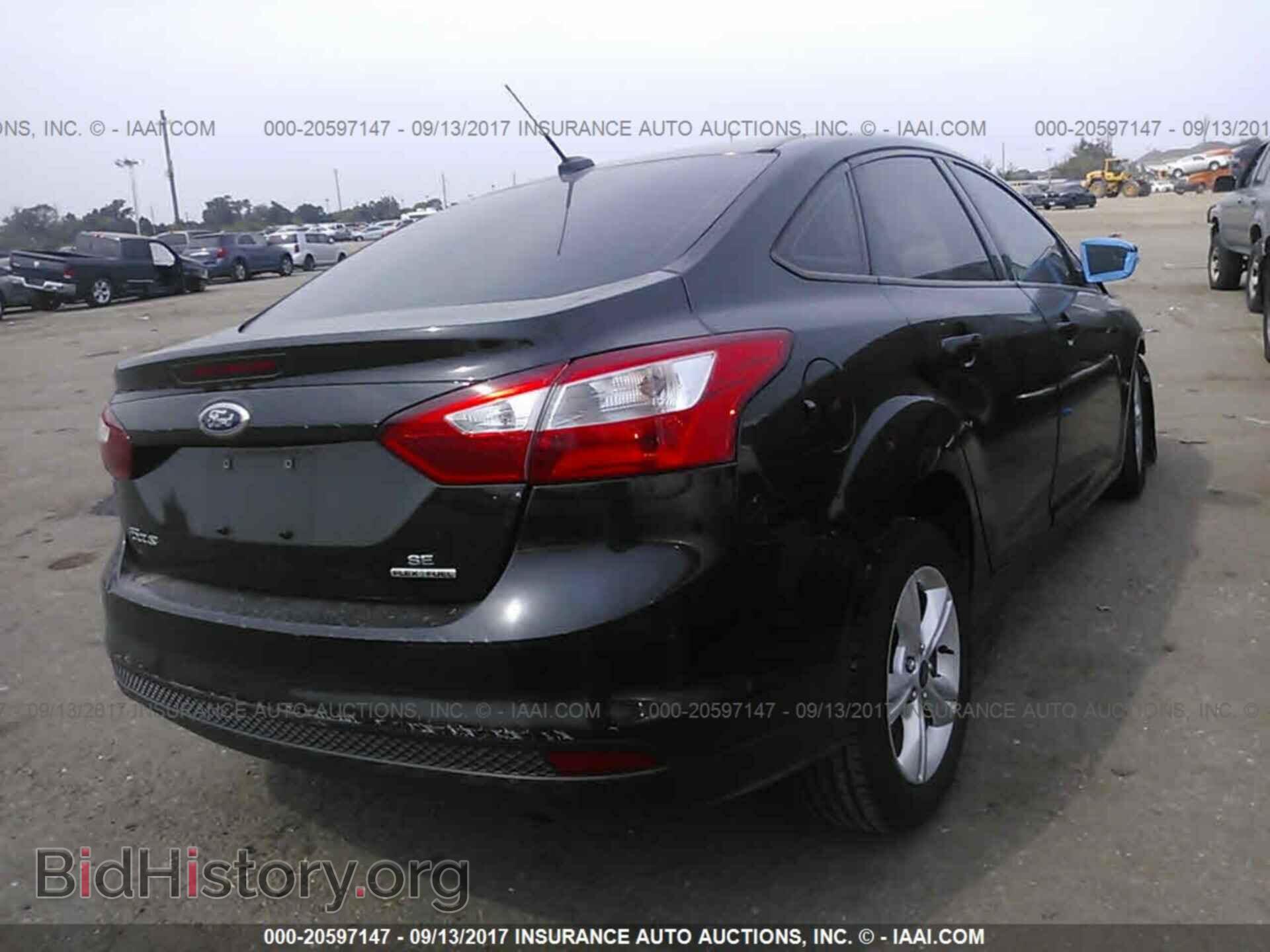 2014 Ford Focus - VIN: 1FADP3F20EL460276 - Фото 4