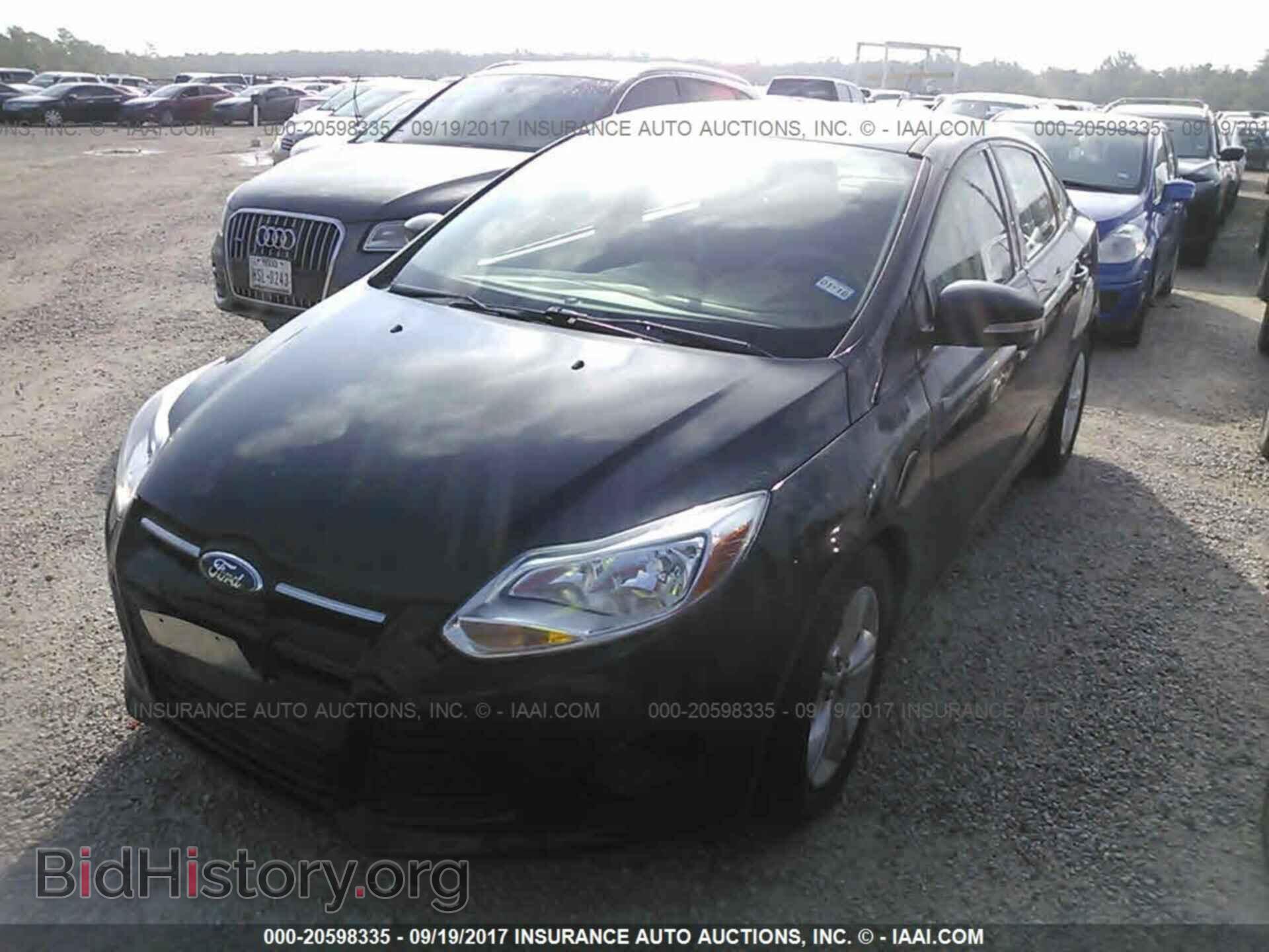 2014 Ford Focus - VIN: 1FADP3F21EL421244 - Фото 2