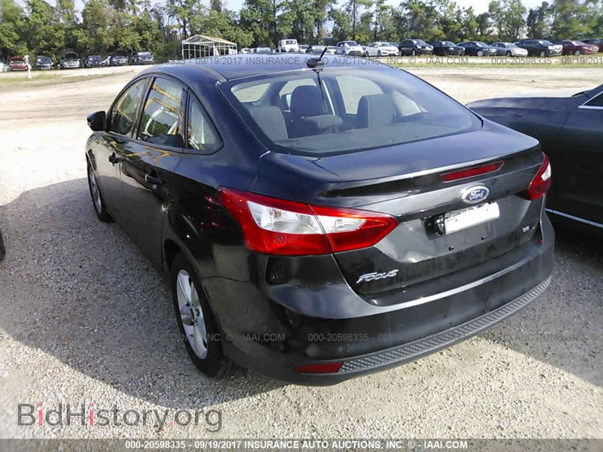 2014 Ford Focus - VIN: 1FADP3F21EL421244 - Фото 3
