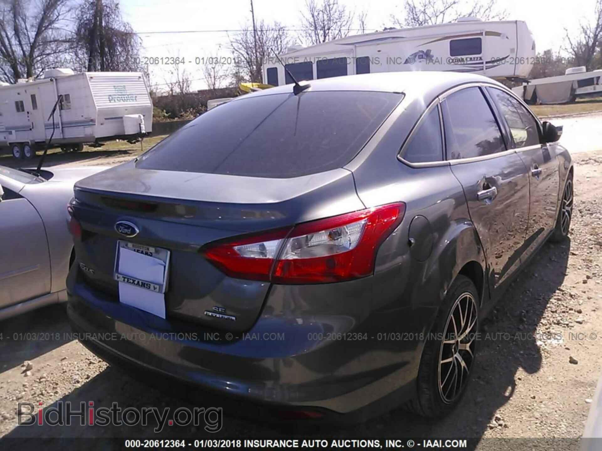 2014 Ford Focus - VIN: 1FADP3F29EL460583 - Photo 4
