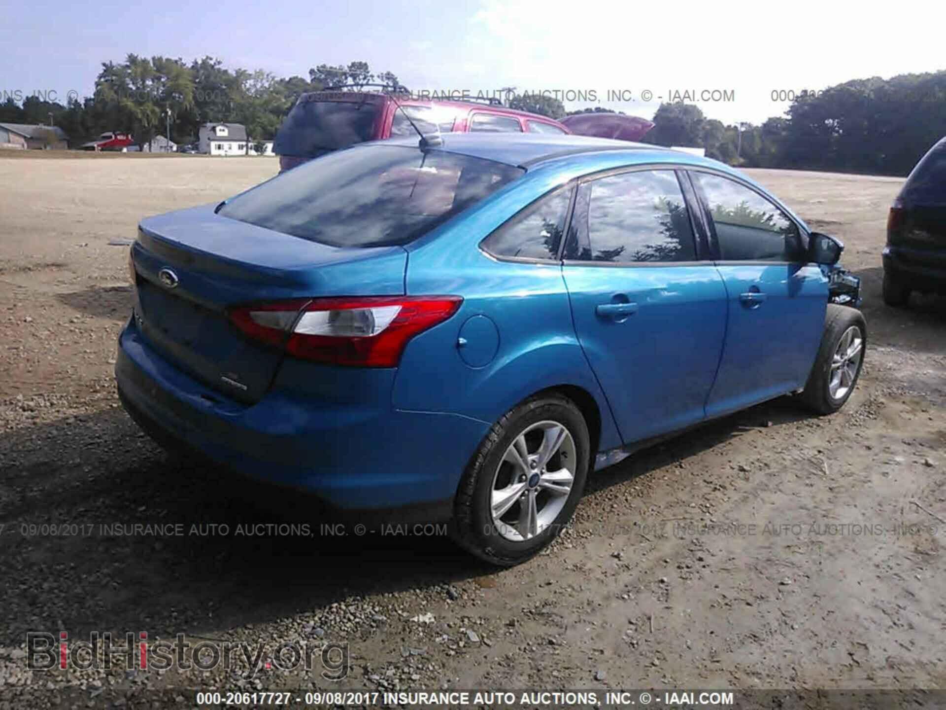 2014 Ford Focus - VIN: 1FADP3F25EL105572 - Фото 4