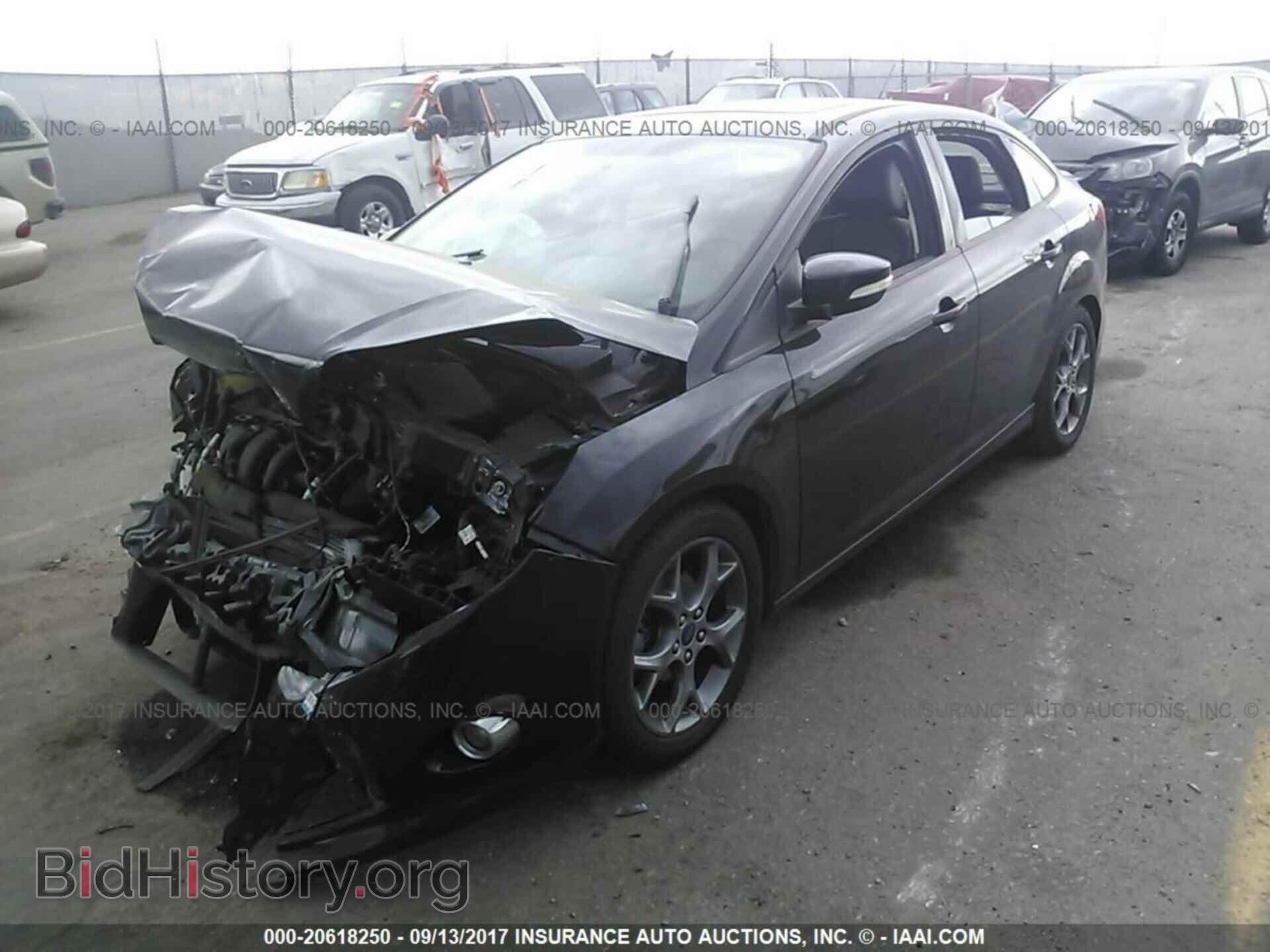 2014 Ford Focus - VIN: 1FADP3F20EL104541 - Photo 2