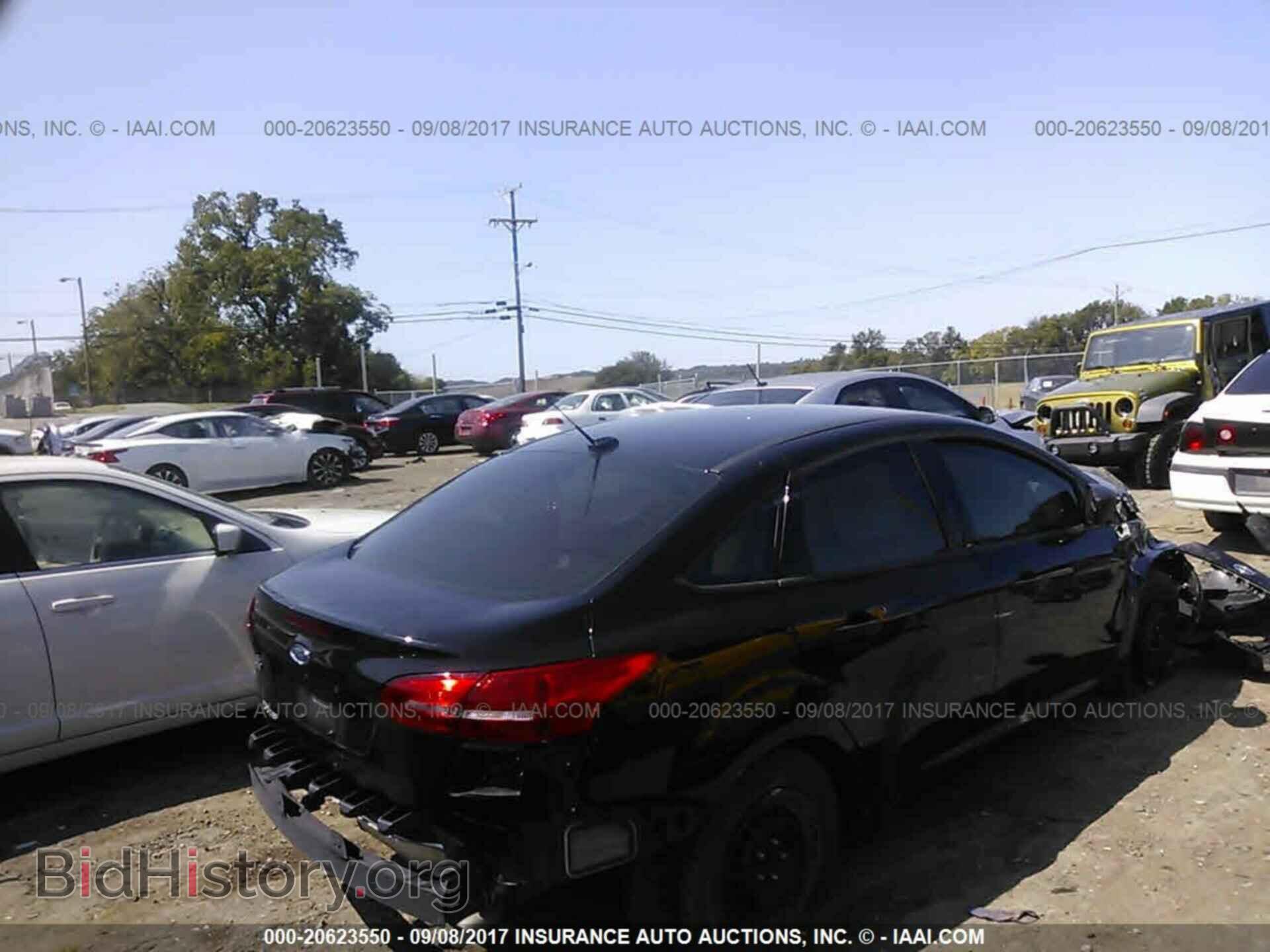 2016 Ford Focus - VIN: 1FADP3E28GL404719 - Фото 4
