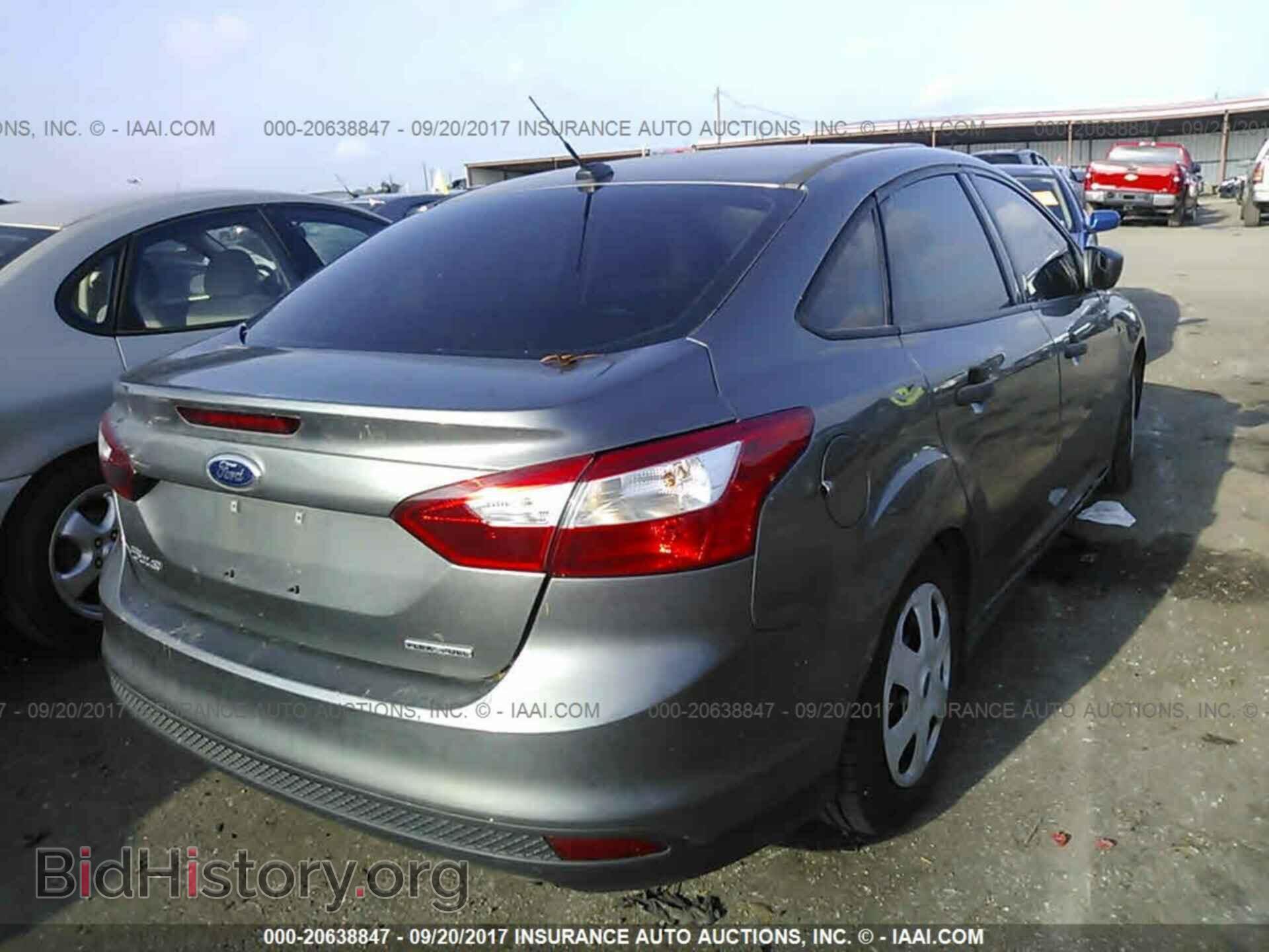 2014 Ford Focus - VIN: 1FADP3E28EL372402 - Фото 4