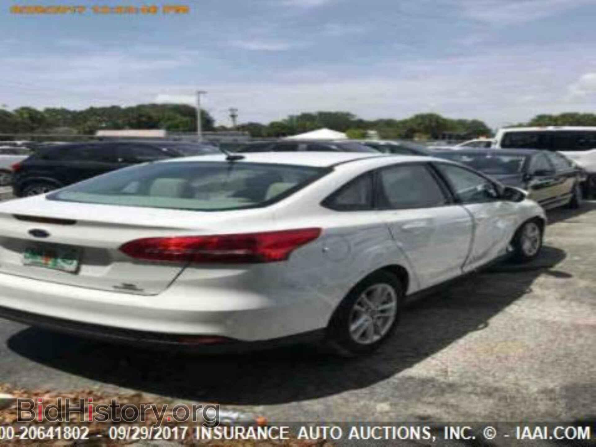 2016 Ford Focus - VIN: 1FADP3F29GL235650 - Photo 4
