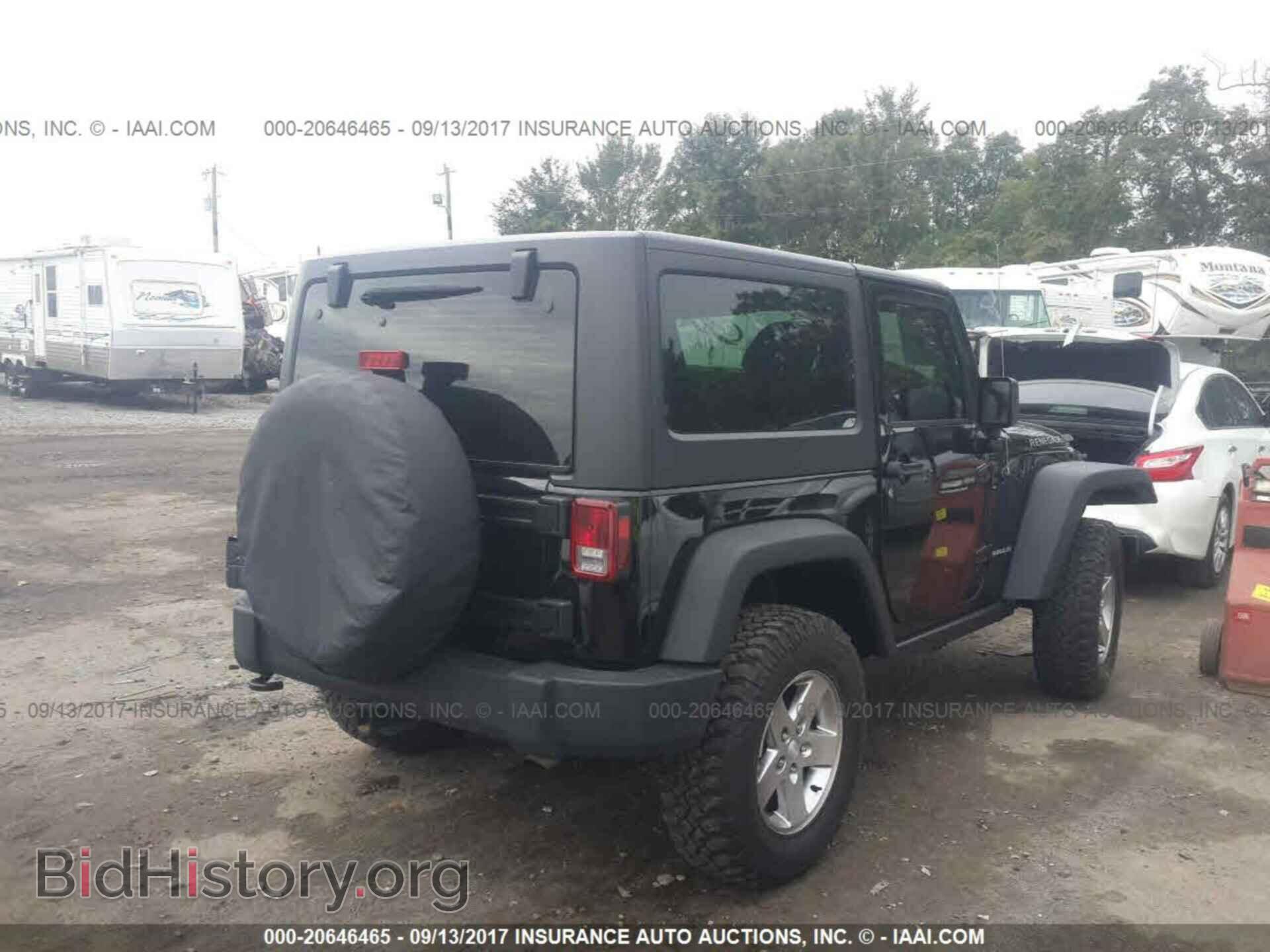 2011 Jeep Wrangler - VIN: 1J4AA2D16BL636143 - Фото 4