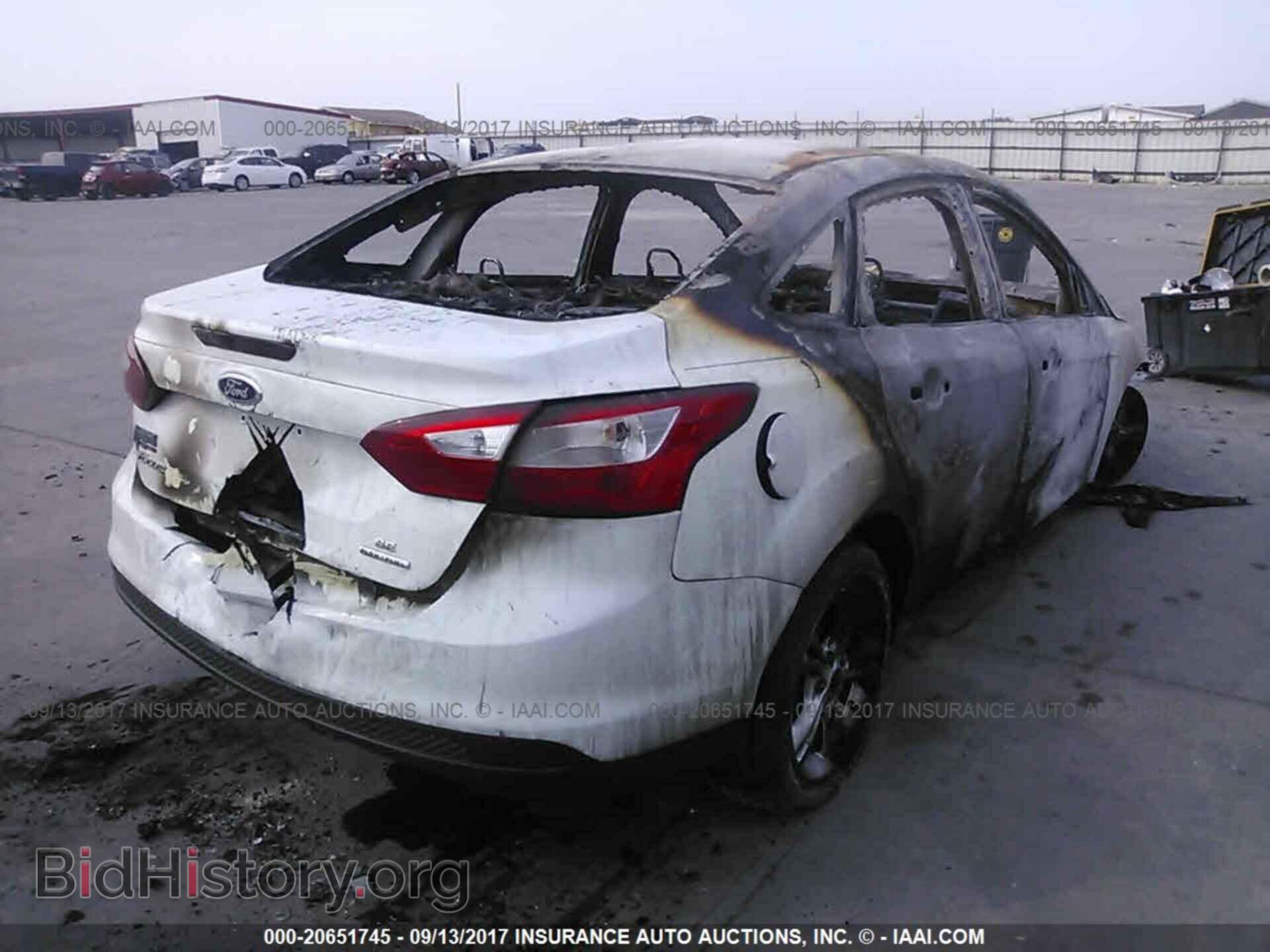 2014 Ford Focus - VIN: 1FADP3F29EL451995 - Фото 4