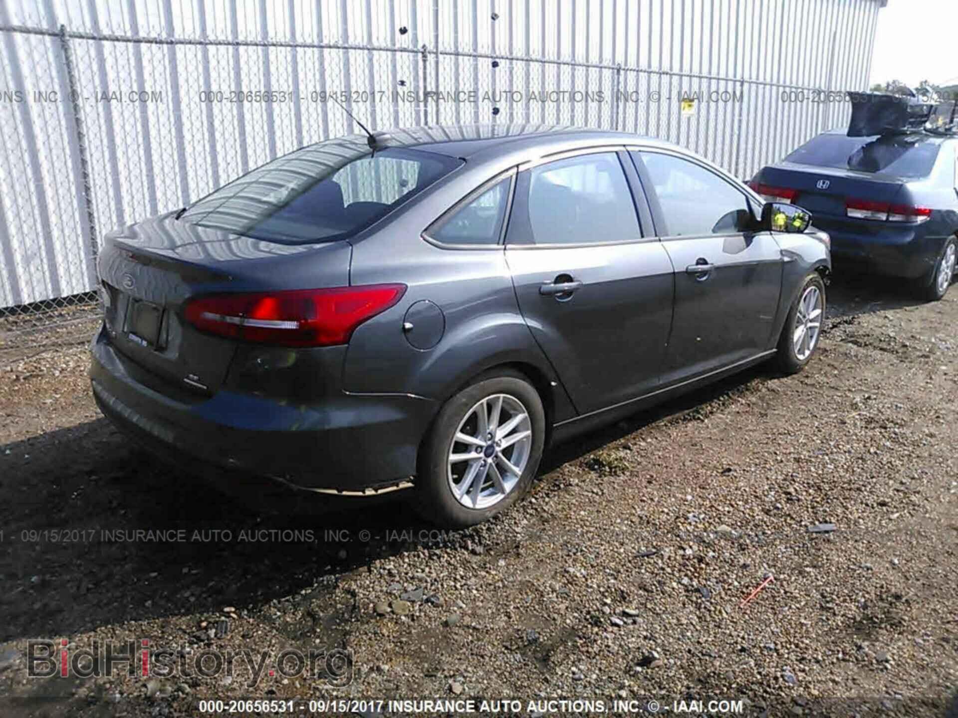2016 Ford Focus - VIN: 1FADP3F26GL279878 - Photo 4
