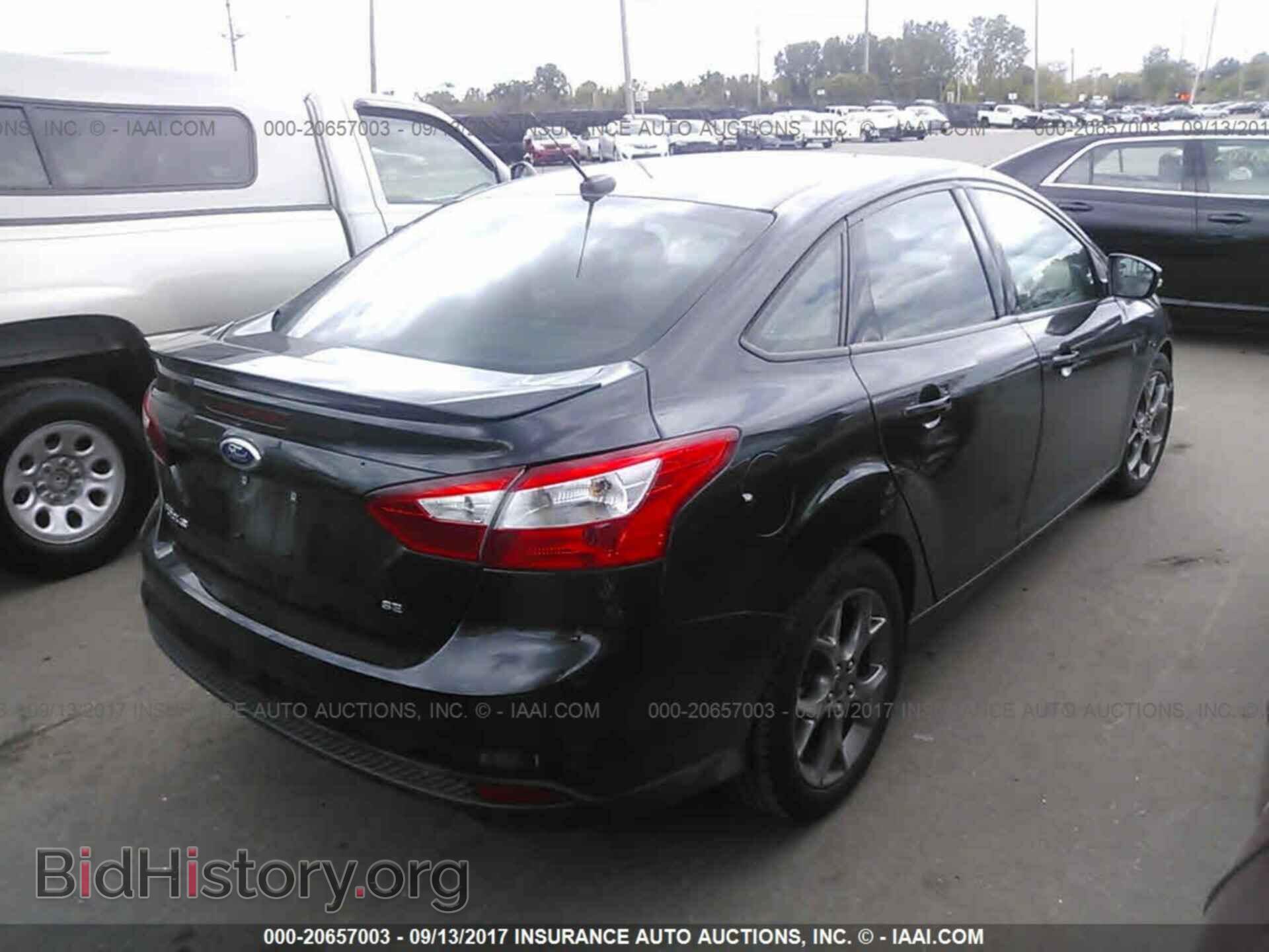 2014 Ford Focus - VIN: 1FADP3F25EL395327 - Фото 4