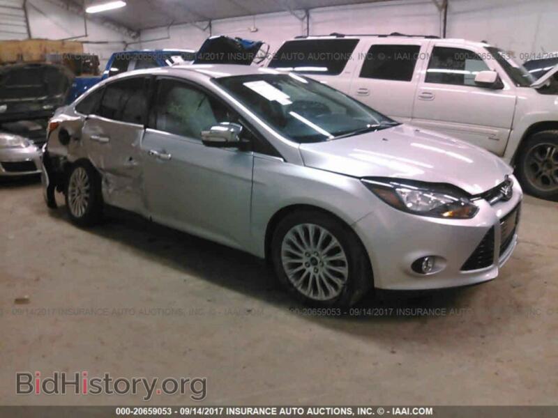 2012 Ford FOCUS (VIN 1FAHP3J2XCL479472) — photo 1 of 10, IAAI, damage: right rear