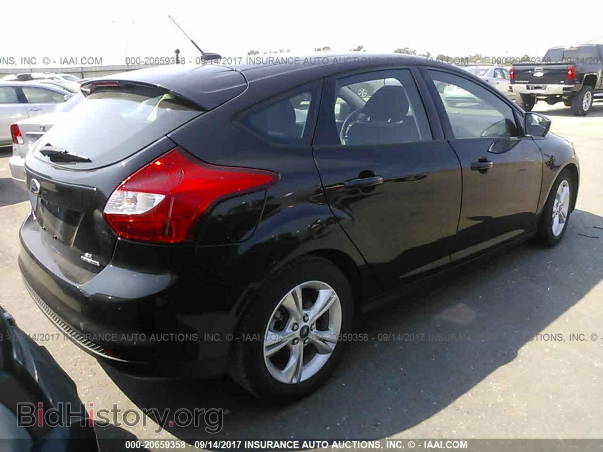 2012 Ford Focus - VIN: 1FAHP3K25CL385823 - Photo 4