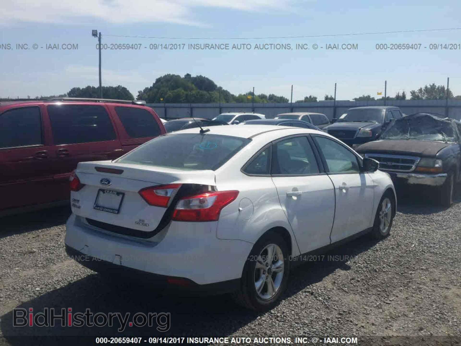 2014 Ford Focus - VIN: 1FADP3F29EL159635 - Photo 4