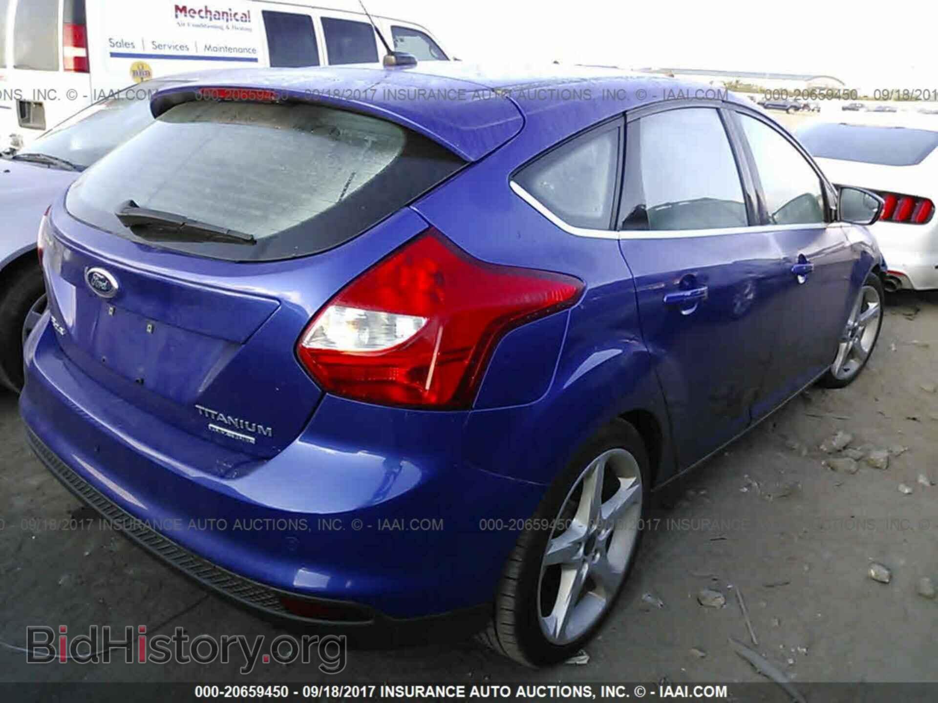 2014 Ford Focus - VIN: 1FADP3N29EL440559 - Фото 4