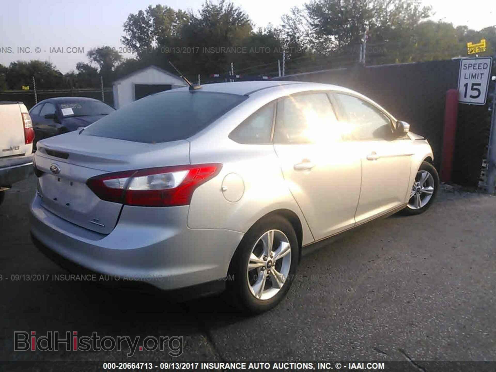 2014 Ford Focus - VIN: 1FADP3F26EL230886 - Фото 4