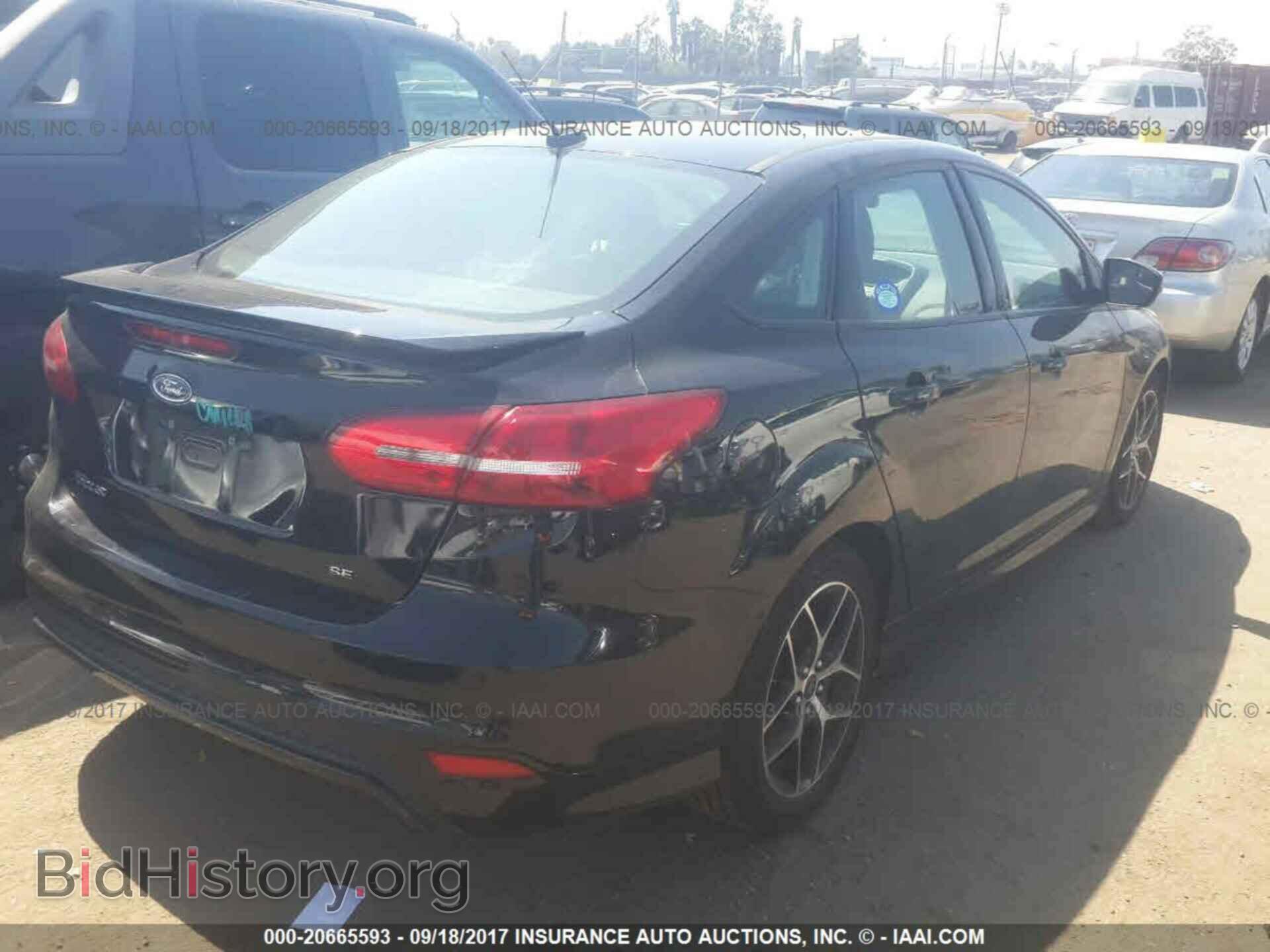 2016 Ford Focus - VIN: 1FADP3F29GL379974 - Photo 4