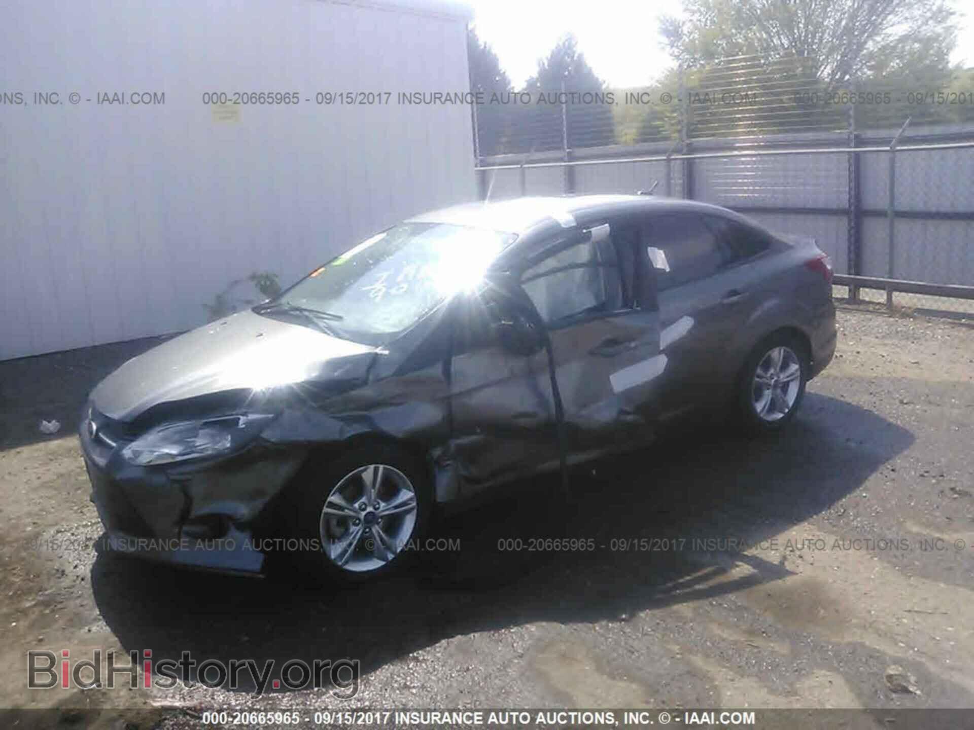 2014 Ford Focus - VIN: 1FADP3F2XEL231071 - Фото 2