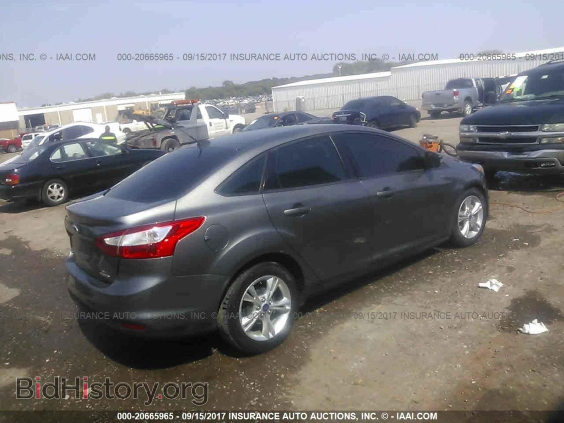 2014 Ford Focus - VIN: 1FADP3F2XEL231071 - Фото 4