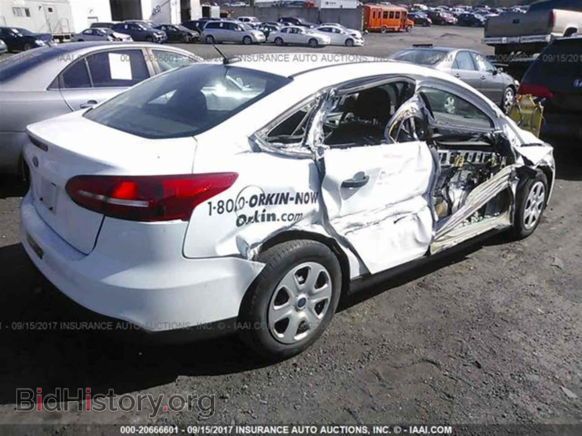 2015 Ford Focus - VIN: 1FADP3E24FL264084 - Photo 4