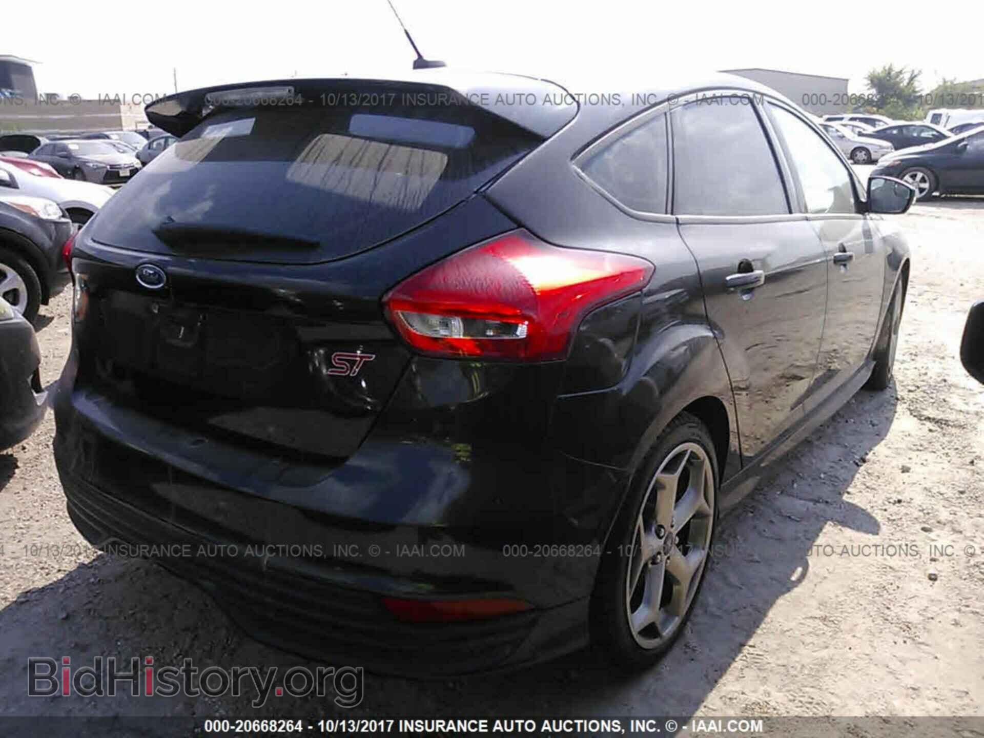 2015 Ford Focus - VIN: 1FADP3L98FL323444 - Photo 4