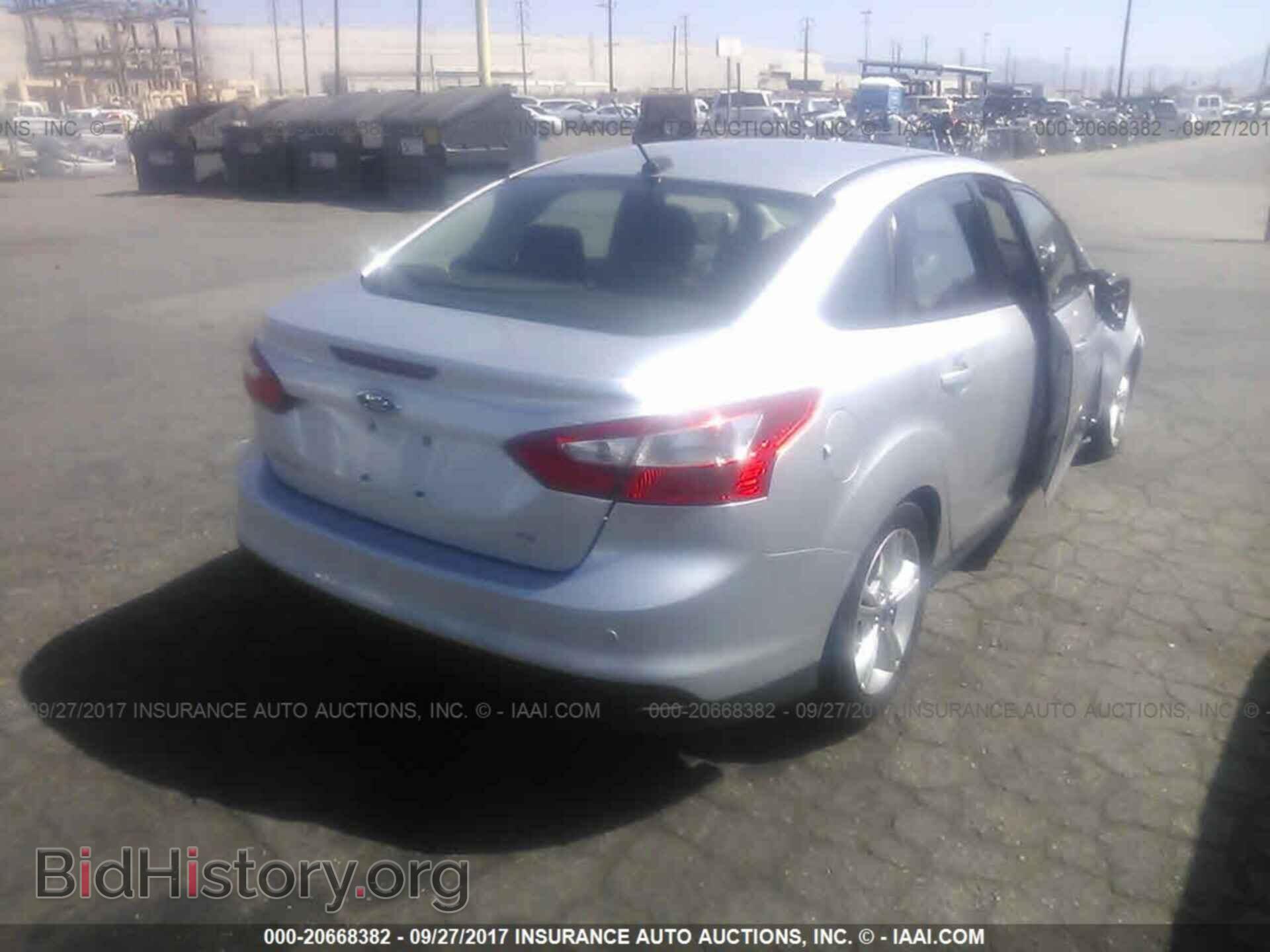 2014 Ford Focus - VIN: 1FADP3F26EL118458 - Photo 4
