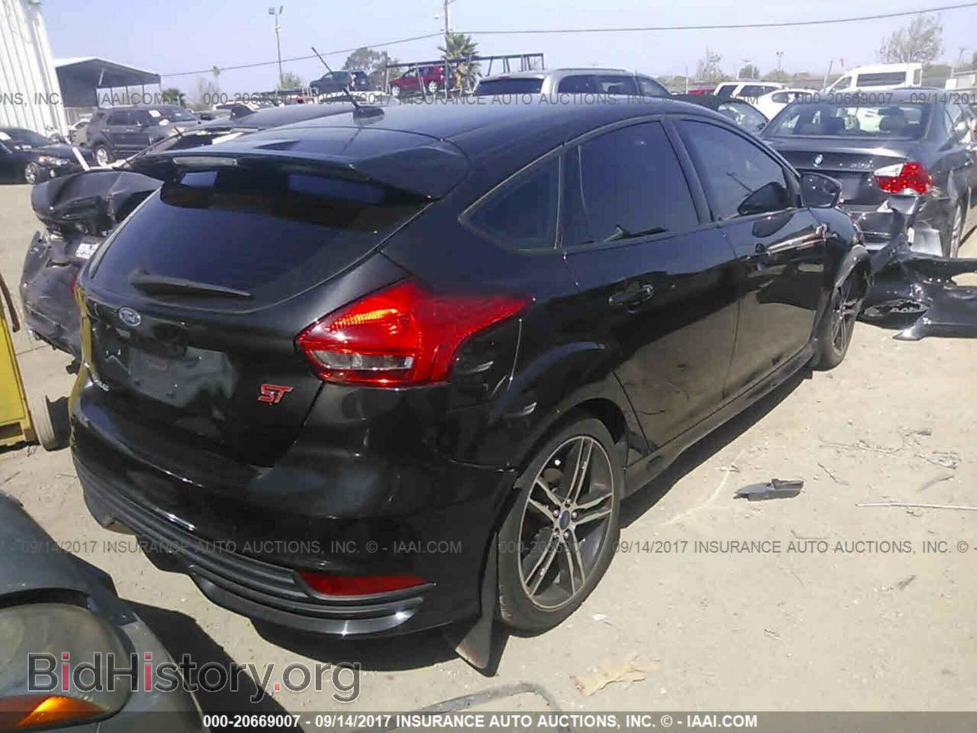 2015 Ford Focus - VIN: 1FADP3L93FL306731 - Photo 4