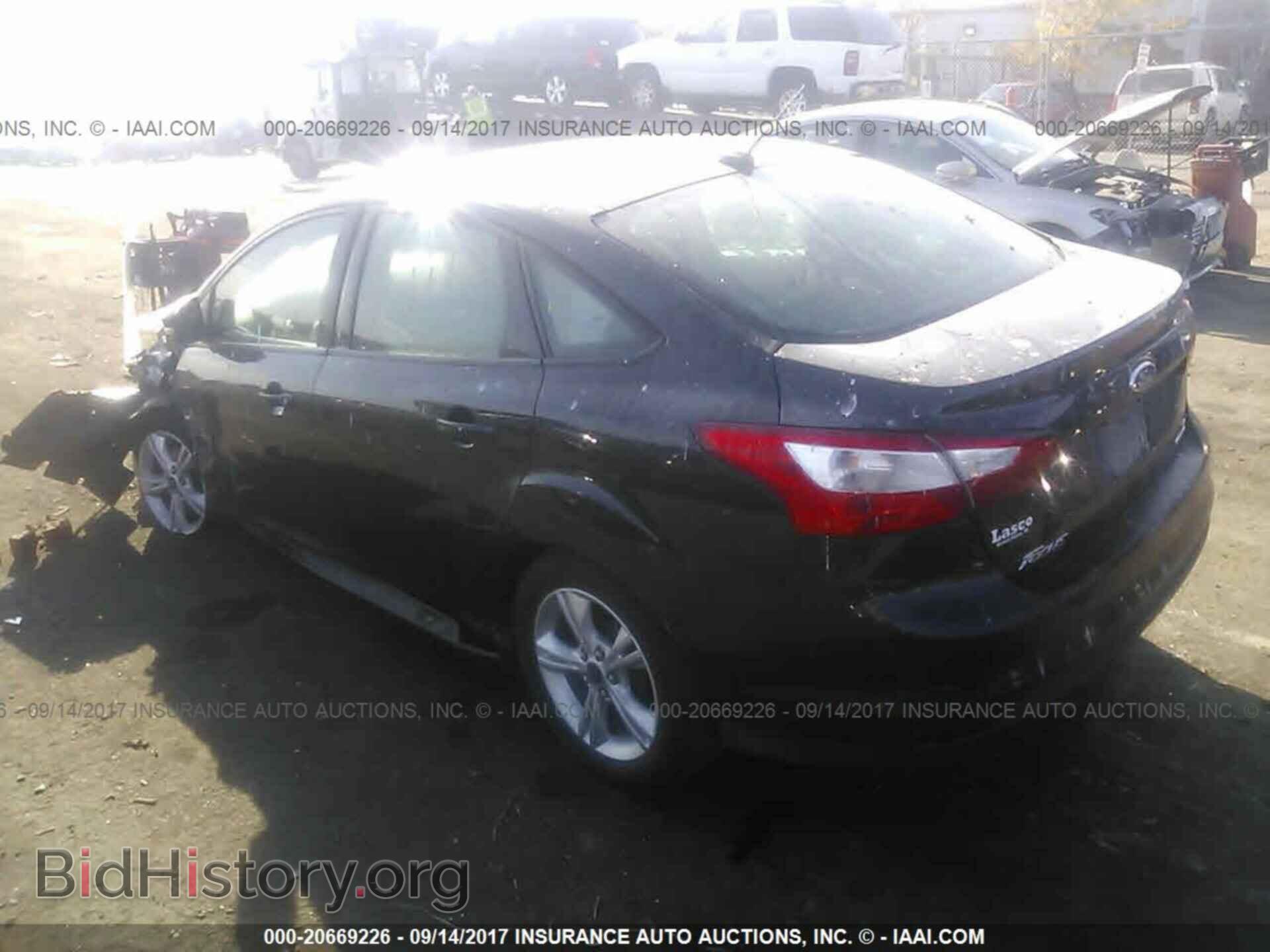 2014 Ford Focus - VIN: 1FADP3F28EL194814 - Фото 3