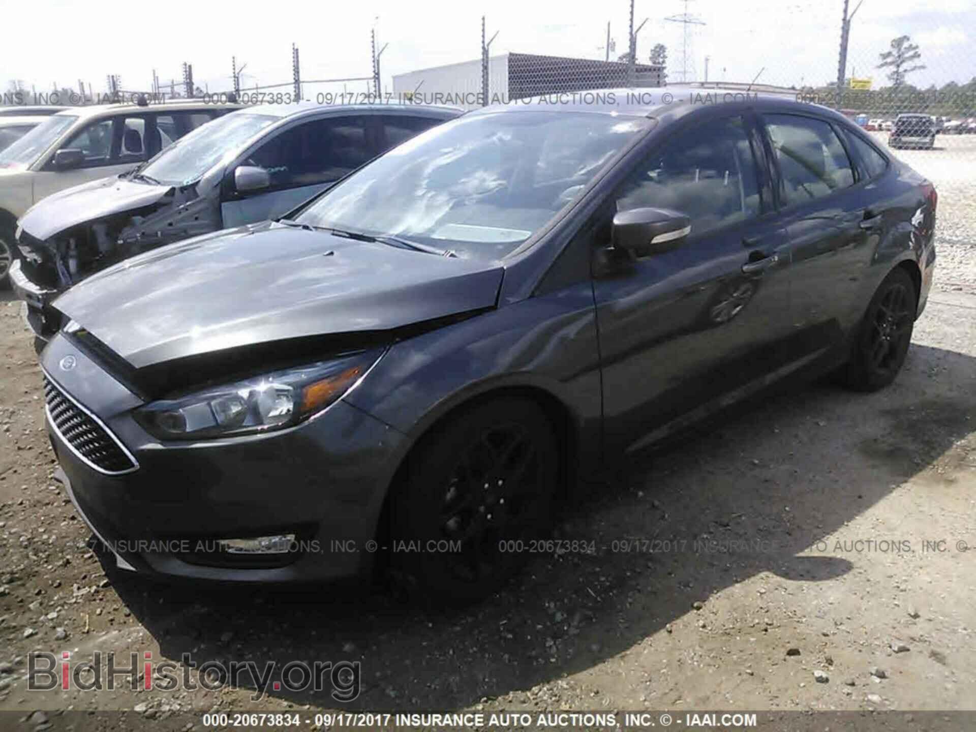 2016 Ford Focus - VIN: 1FADP3F2XGL328127 - Фото 2