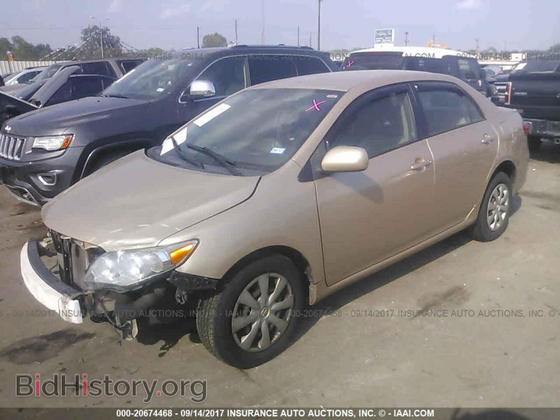 2011 Toyota Corolla - VIN: JTDBU4EE8B9148324 - Фото 2