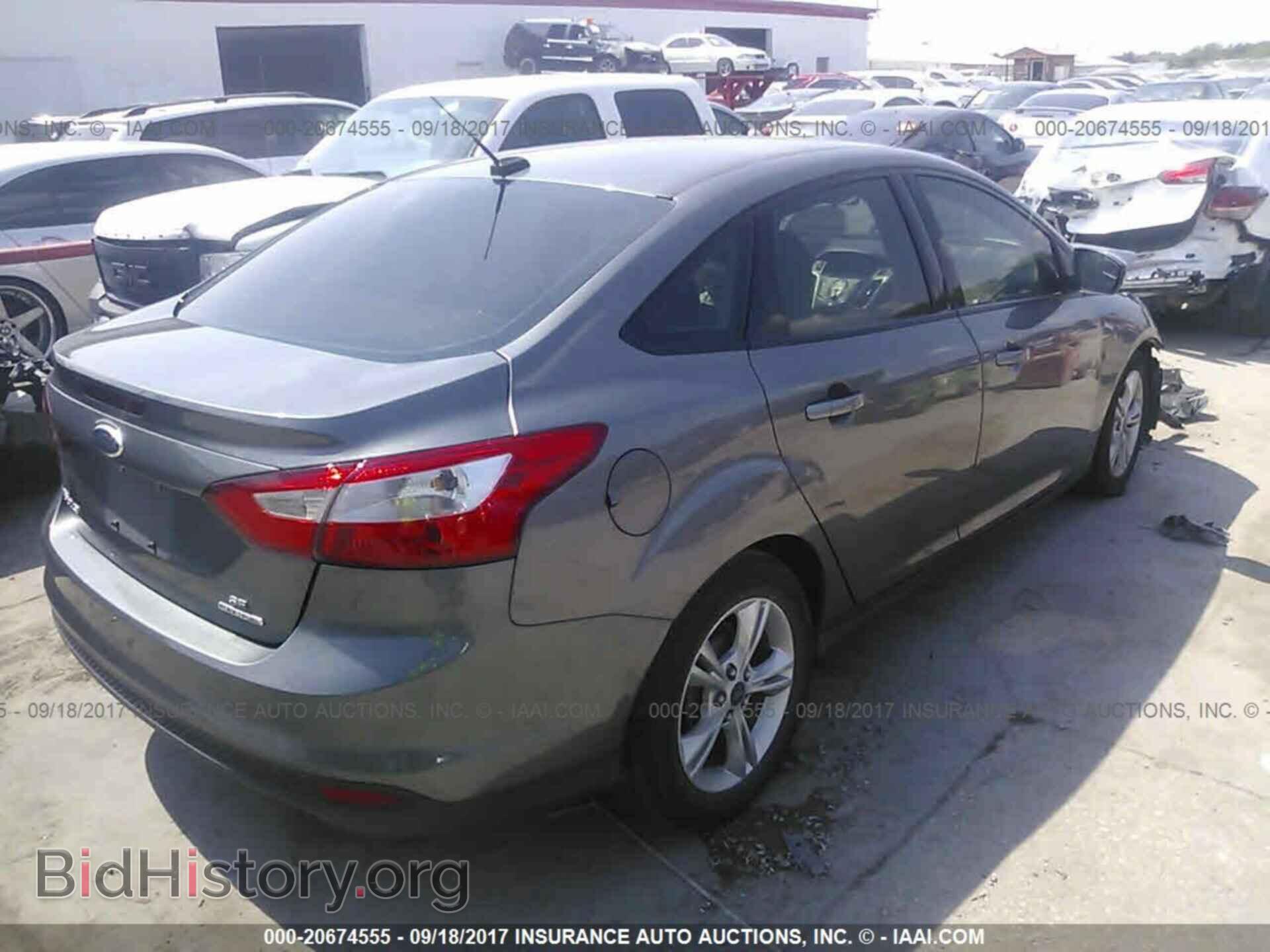 2014 Ford Focus - VIN: 1FADP3F23EL130258 - Фото 4