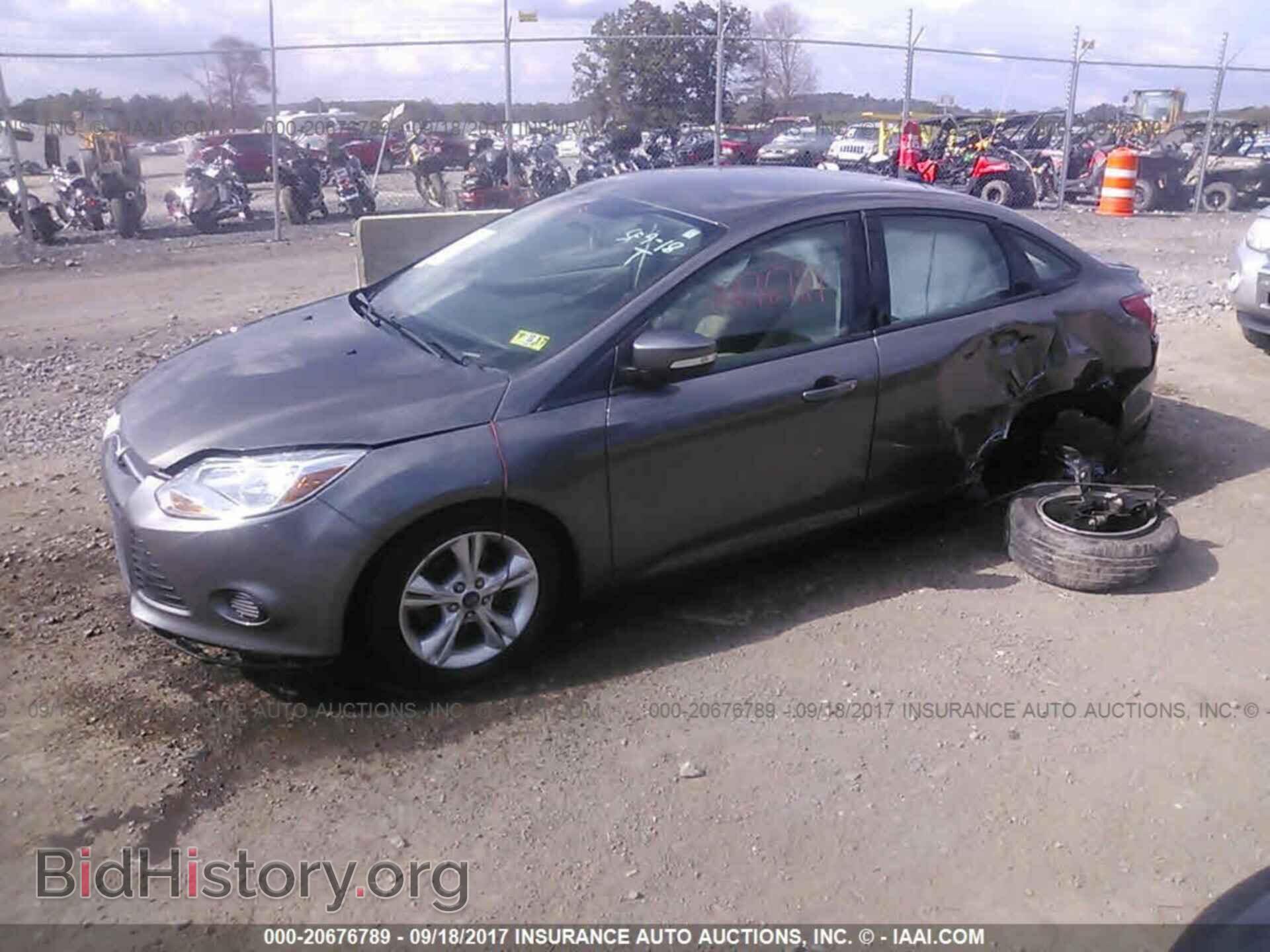 2013 Ford Focus - VIN: 1FADP3F24DL330662 - Photo 2