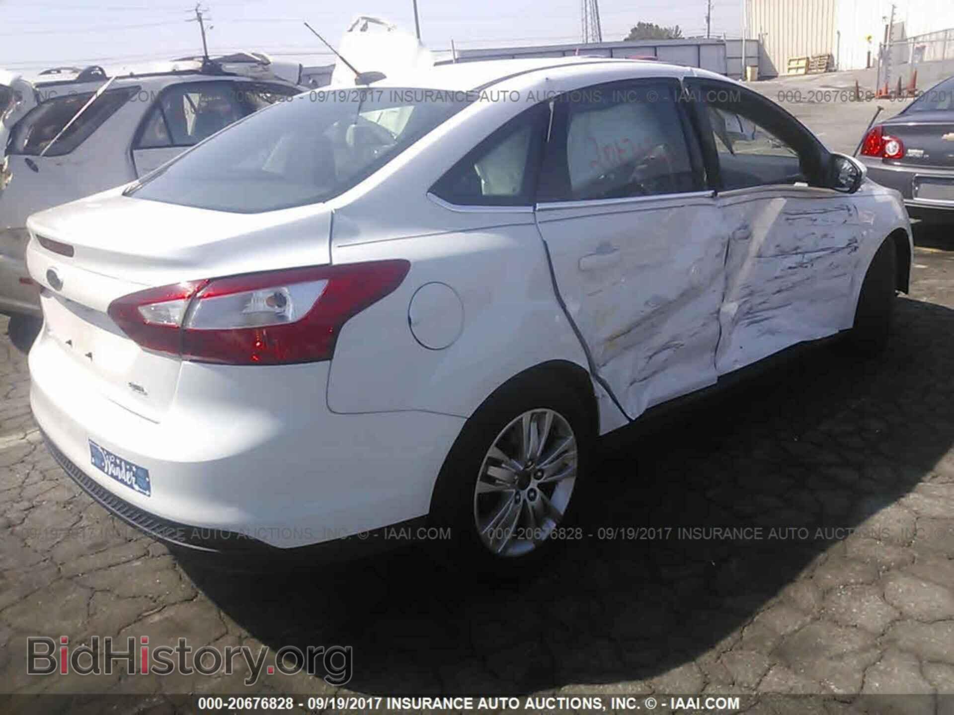 2012 Ford Focus - VIN: 1FAHP3H27CL363555 - Photo 4