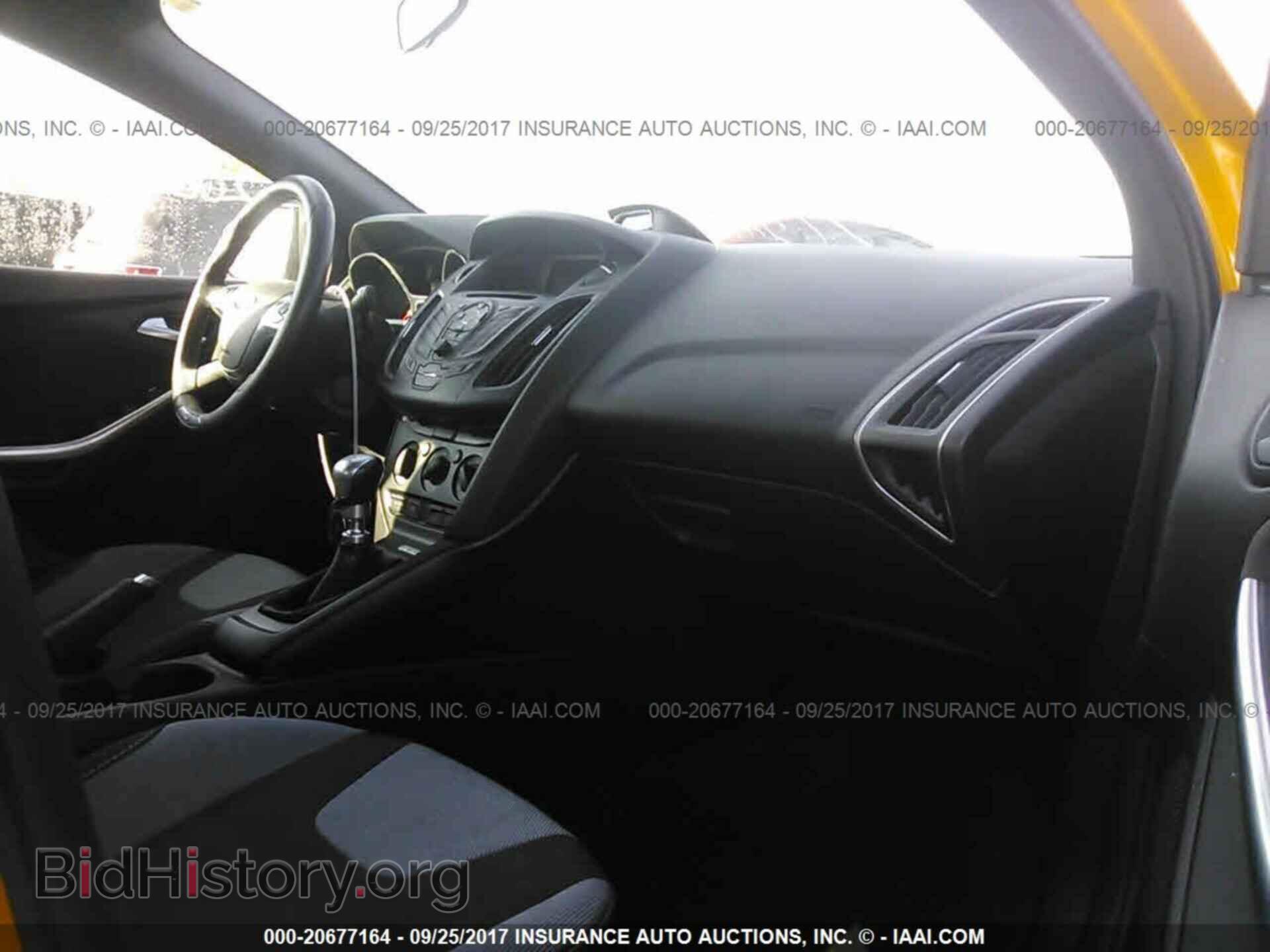 2014 Ford Focus - VIN: 1FADP3L92EL388529 - Фото 5