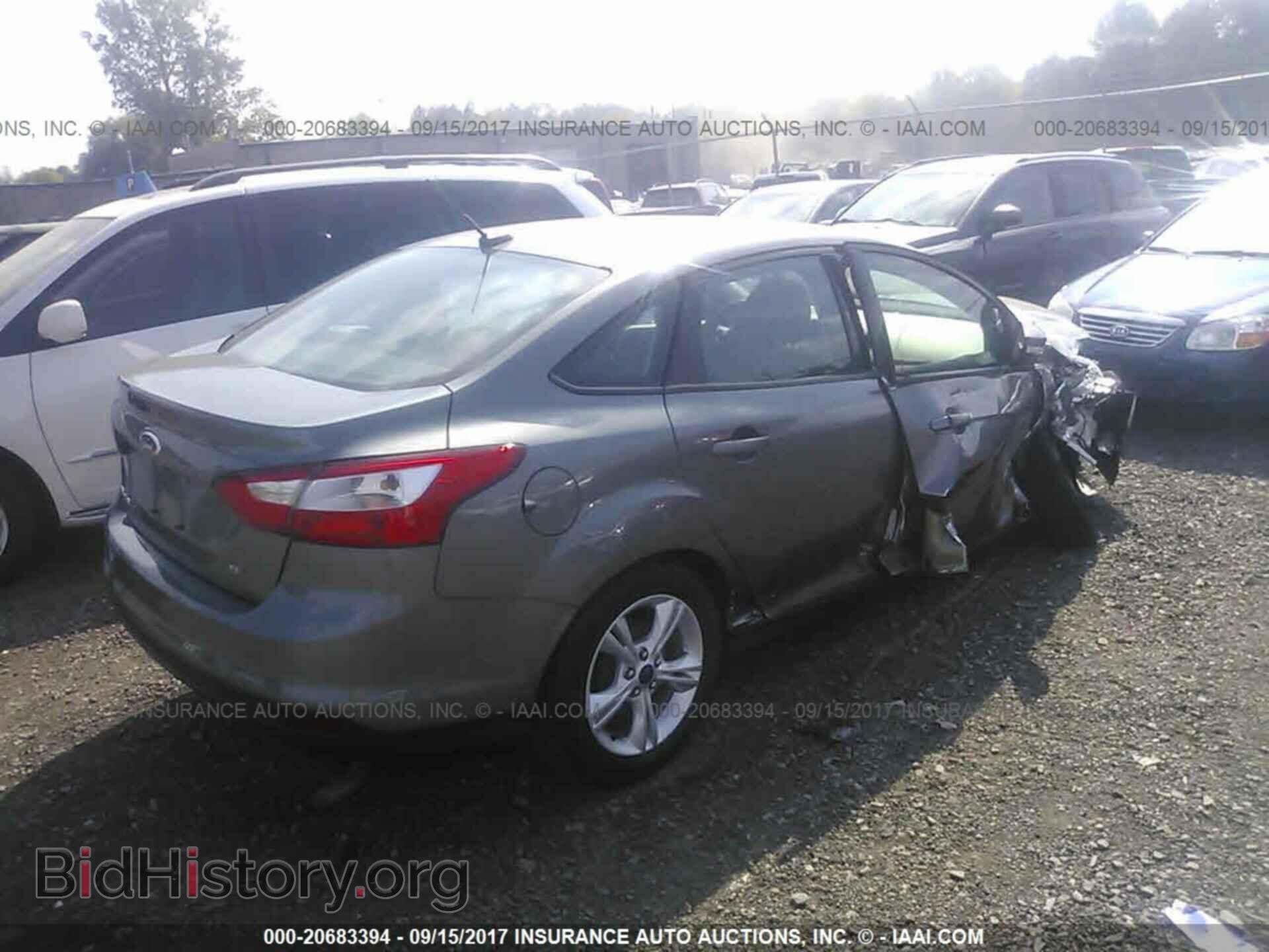 2014 Ford Focus - VIN: 1FADP3F2XEL404586 - Фото 4