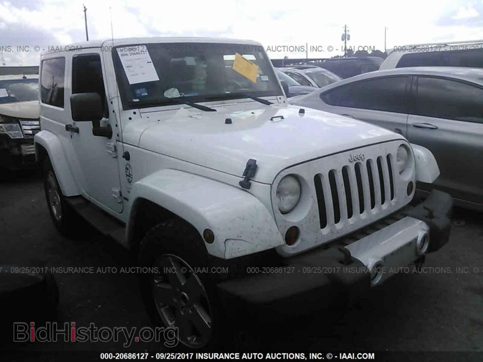 Фотография 1J4GA5D16BL572116 - Jeep Wrangler 2011