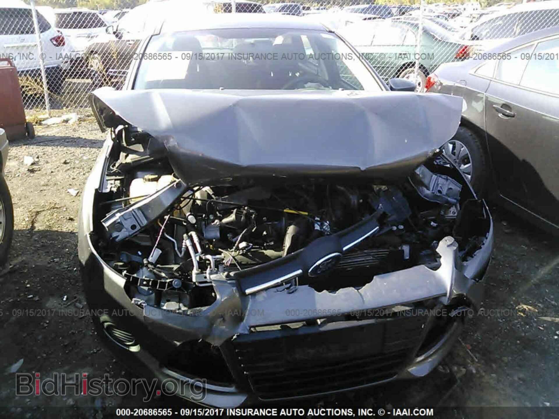 2014 Ford Focus - VIN: 1FADP3F24EL216114 - Фото 6