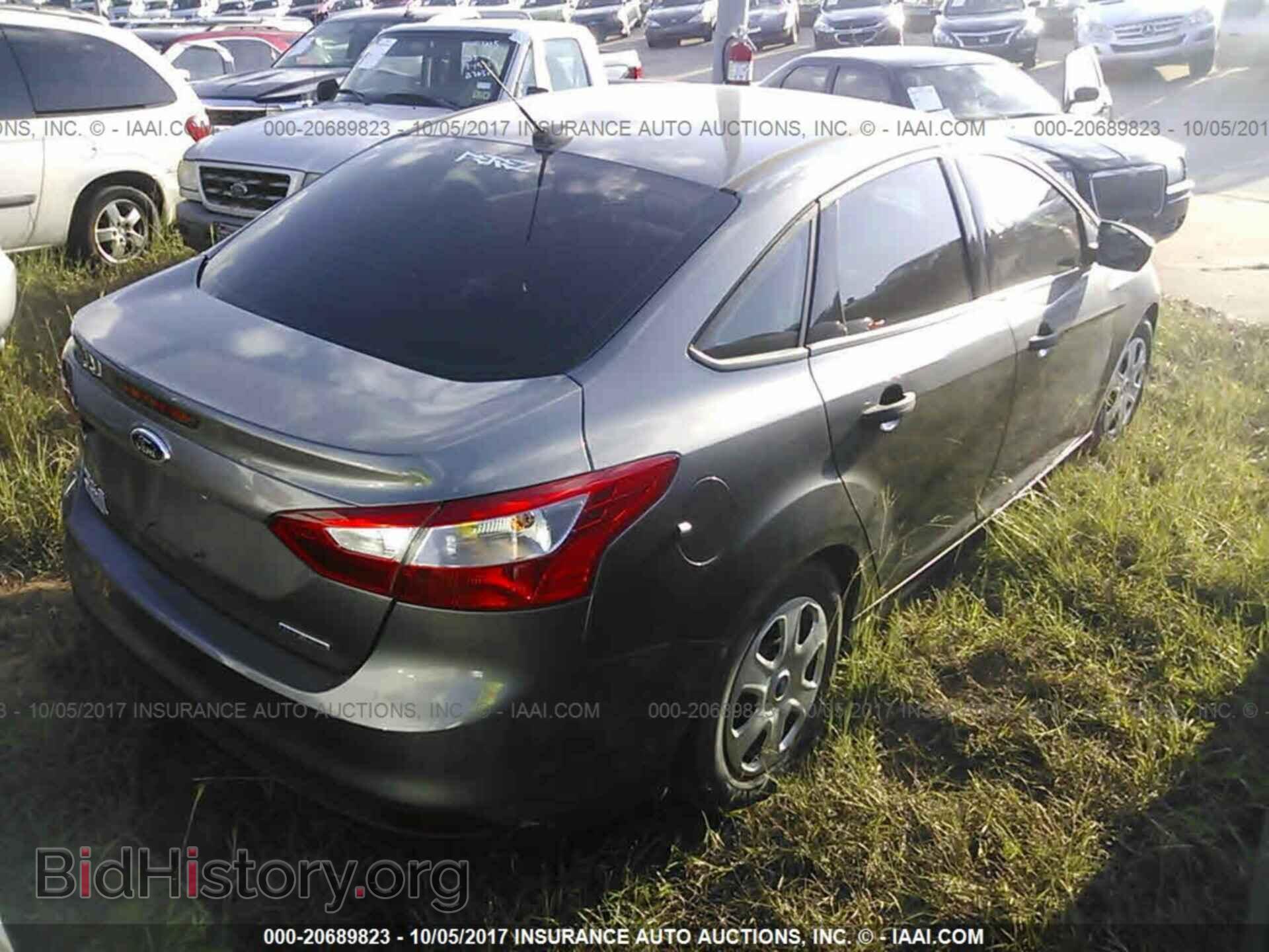 2014 Ford Focus - VIN: 1FADP3E24EL293535 - Фото 4