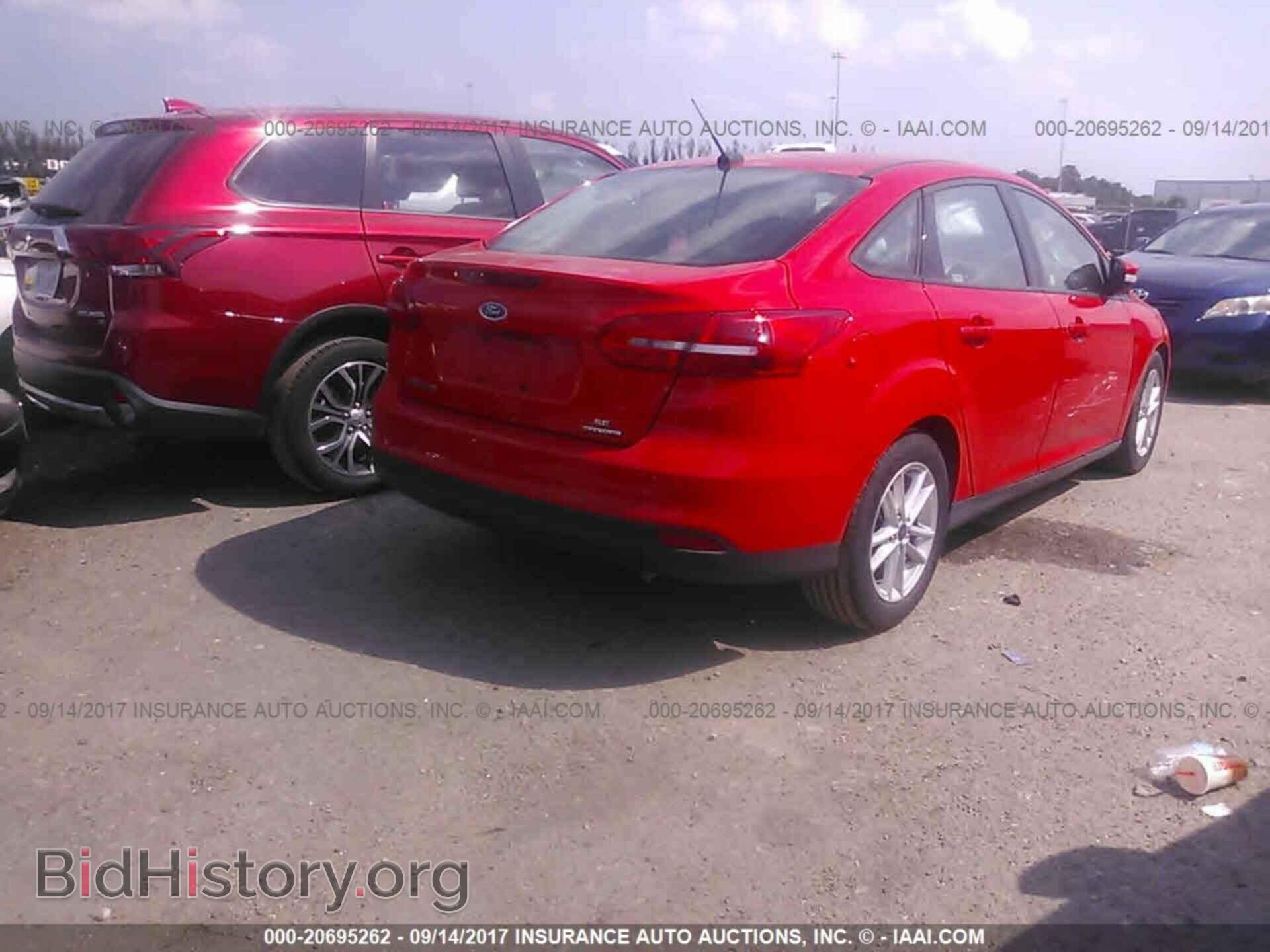 2016 Ford Focus - VIN: 1FADP3F24GL291348 - Photo 4