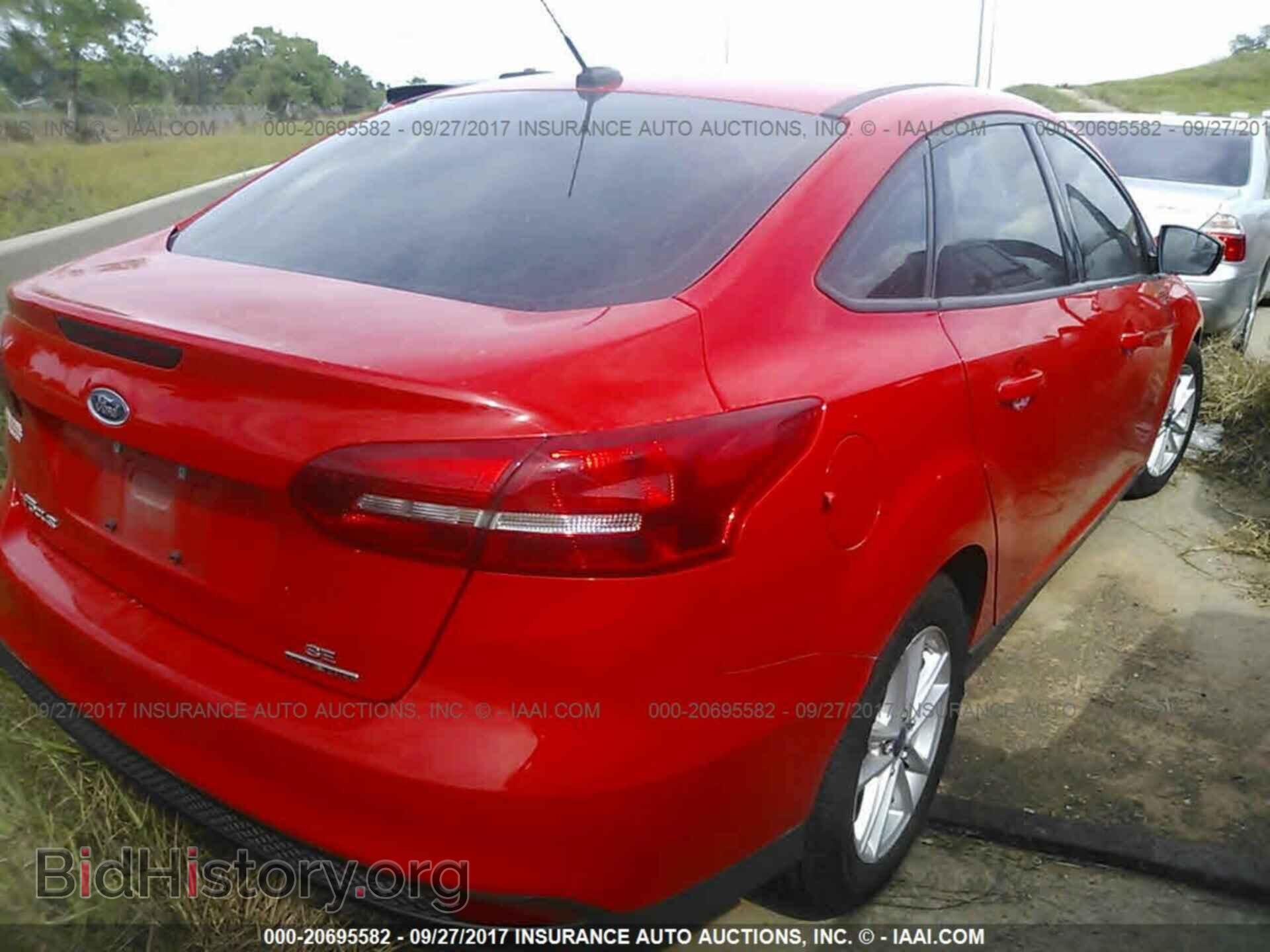 2015 Ford Focus - VIN: 1FADP3F23FL313595 - Photo 4