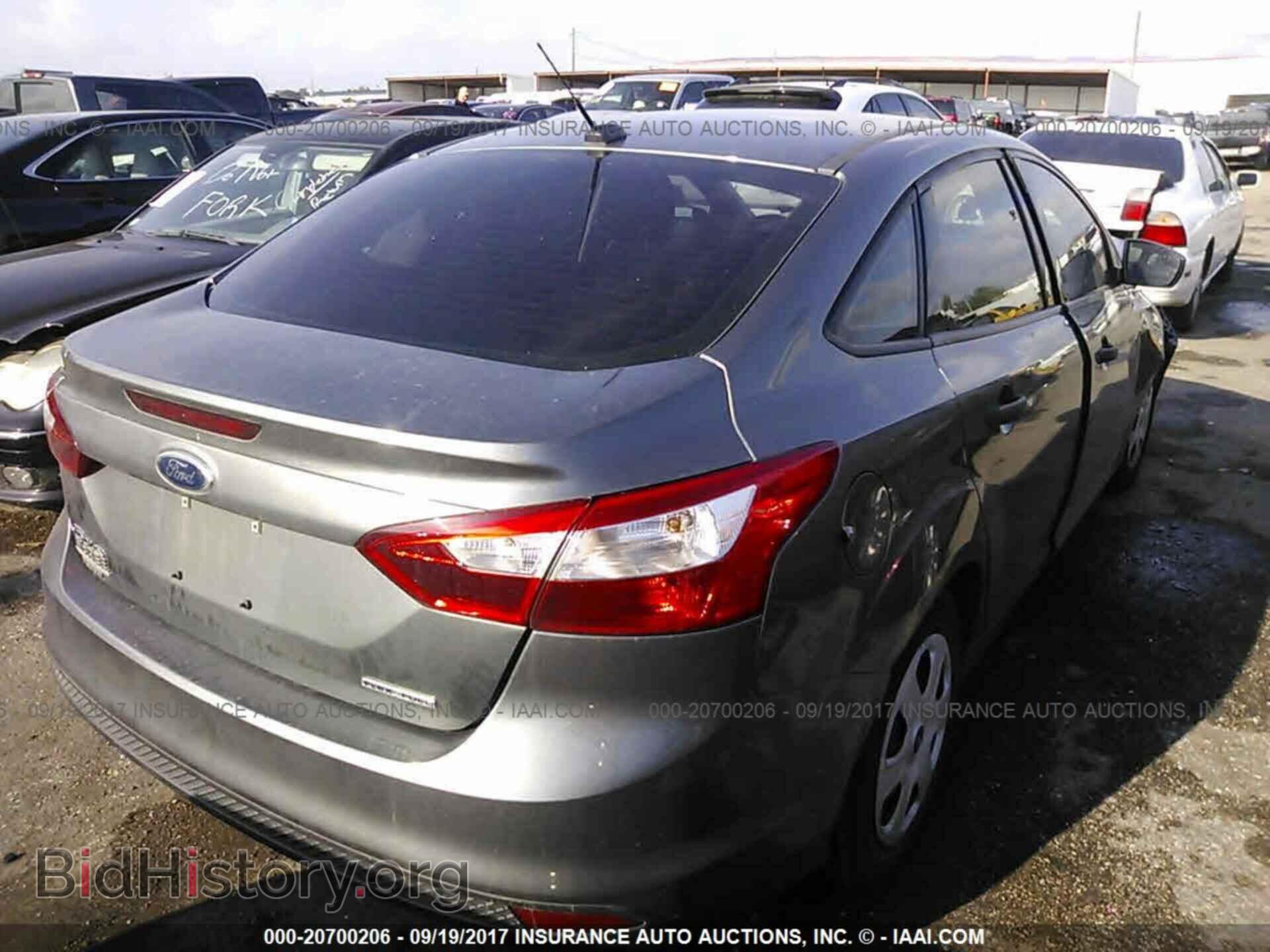 2014 Ford Focus - VIN: 1FADP3E21EL213320 - Фото 4