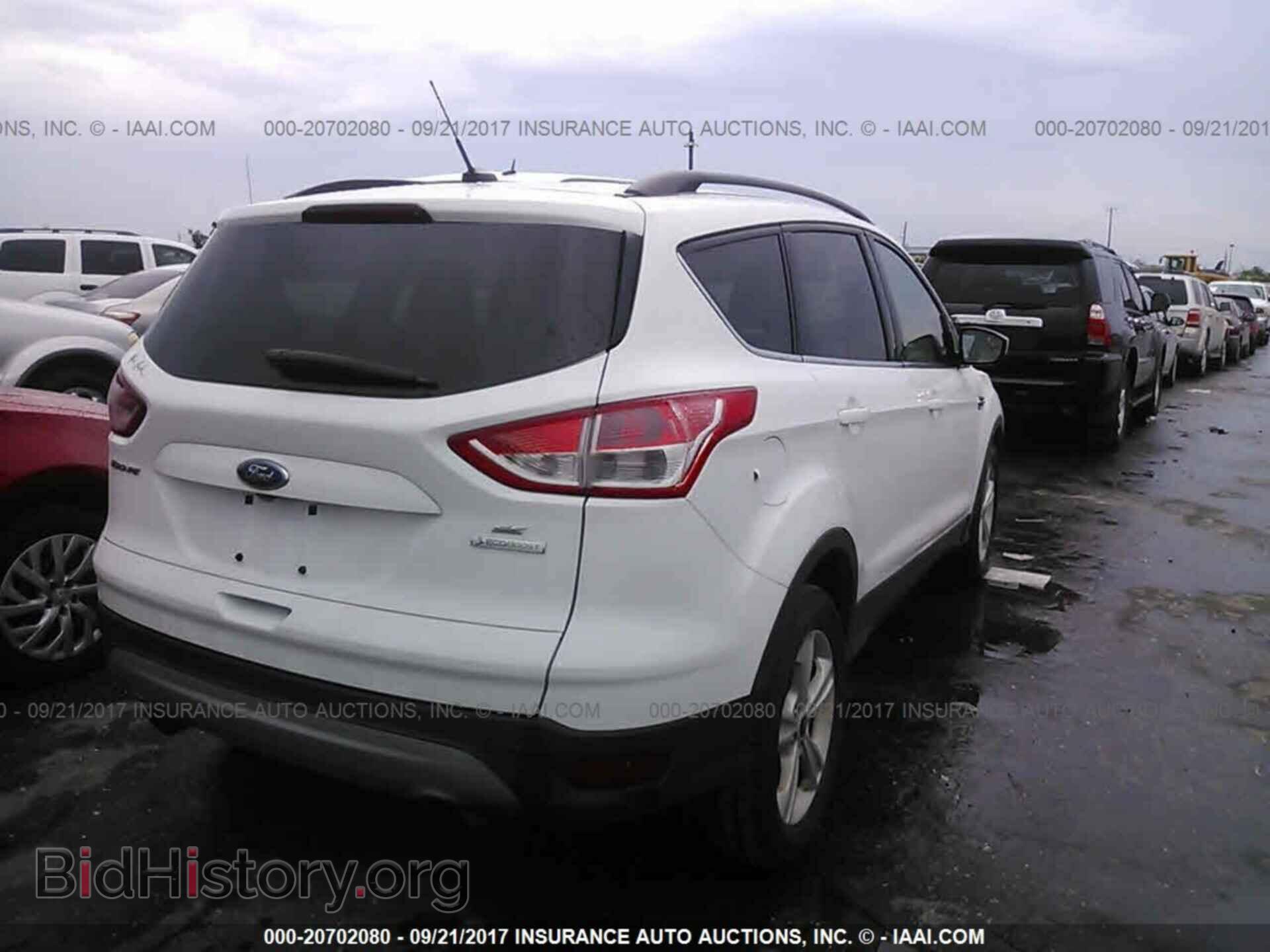 2014 Ford Escape - VIN: 1FMCU0G99EUA71506 - Фото 4