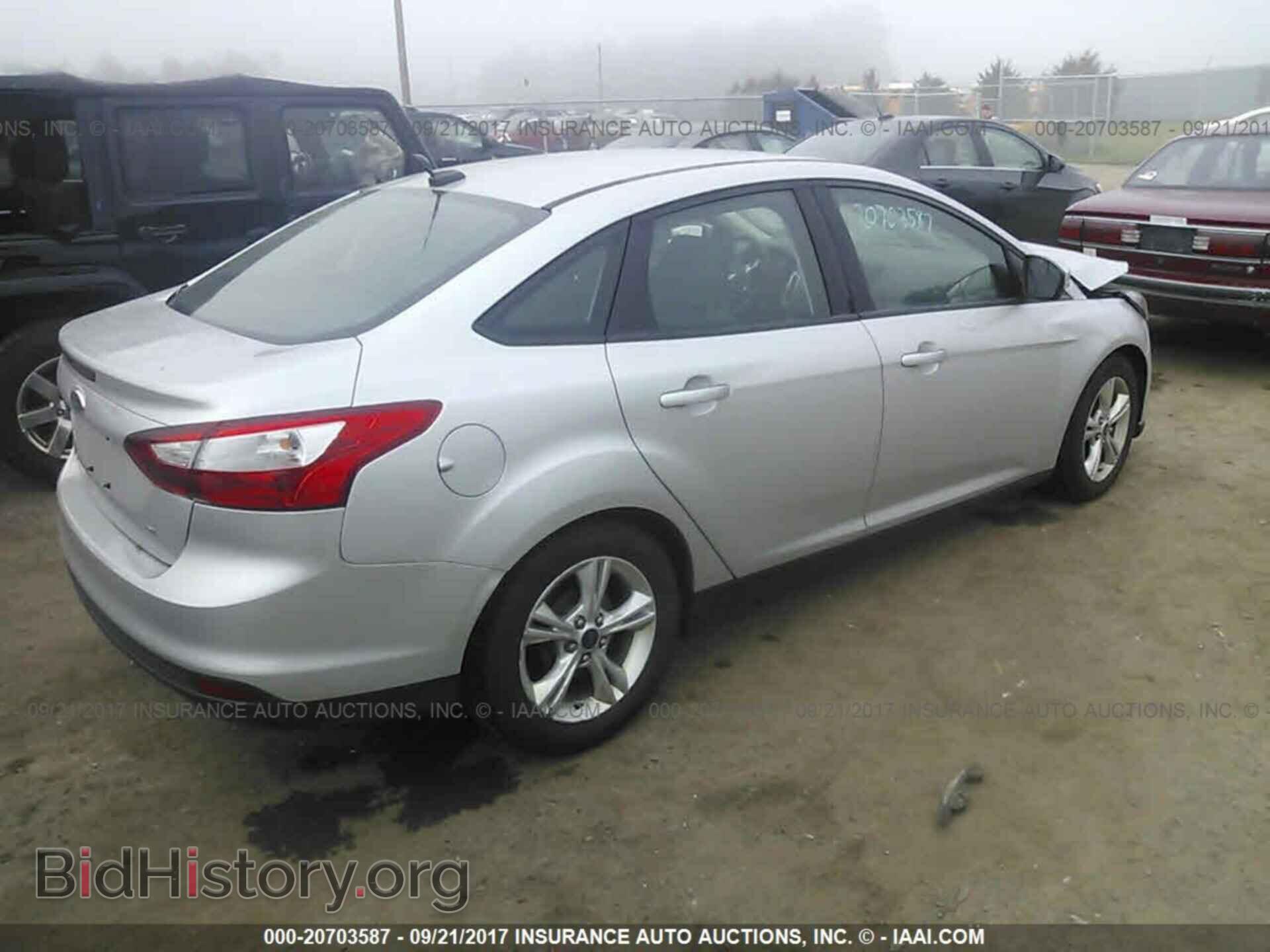 2014 Ford Focus - VIN: 1FADP3F29EL240912 - Фото 4