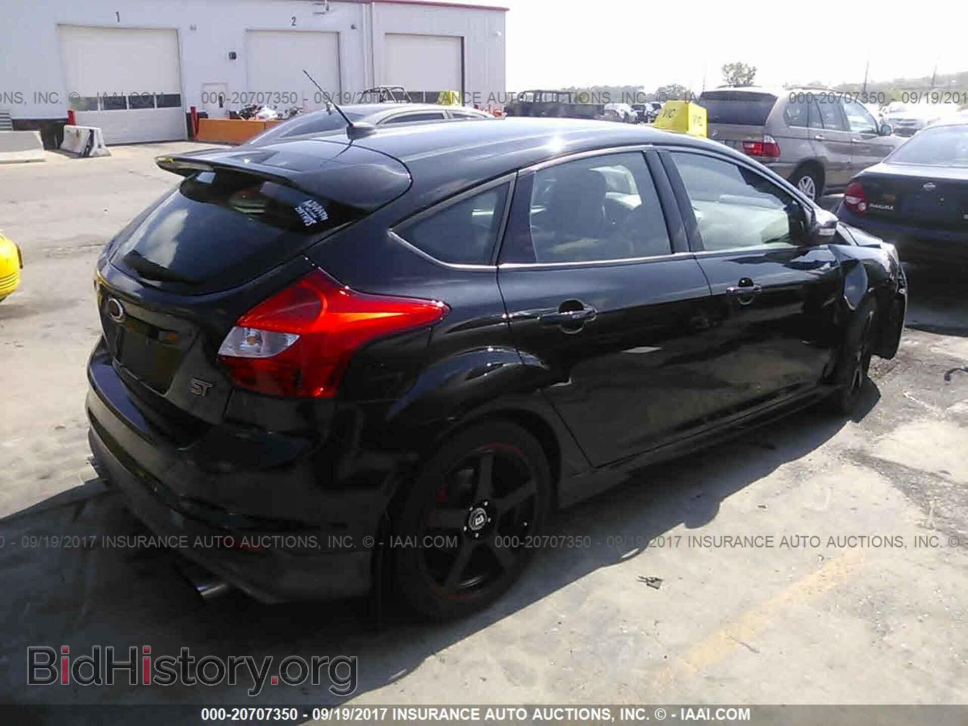 2014 Ford Focus - VIN: 1FADP3L99EL164075 - Photo 4