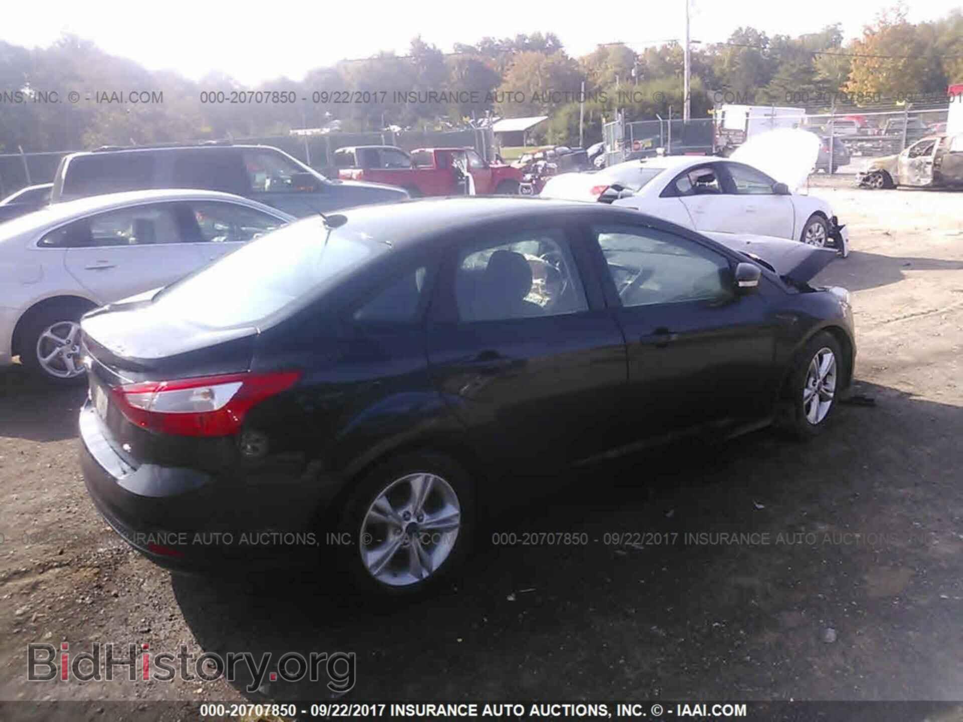 2014 Ford Focus - VIN: 1FADP3F22EL286064 - Photo 4