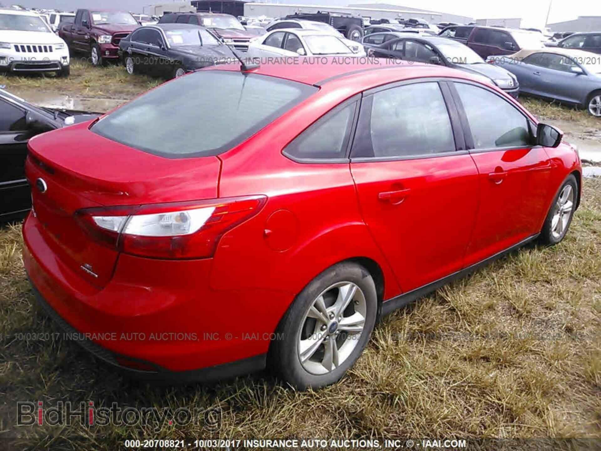 2014 Ford Focus - VIN: 1FADP3F21EL168703 - Фото 4