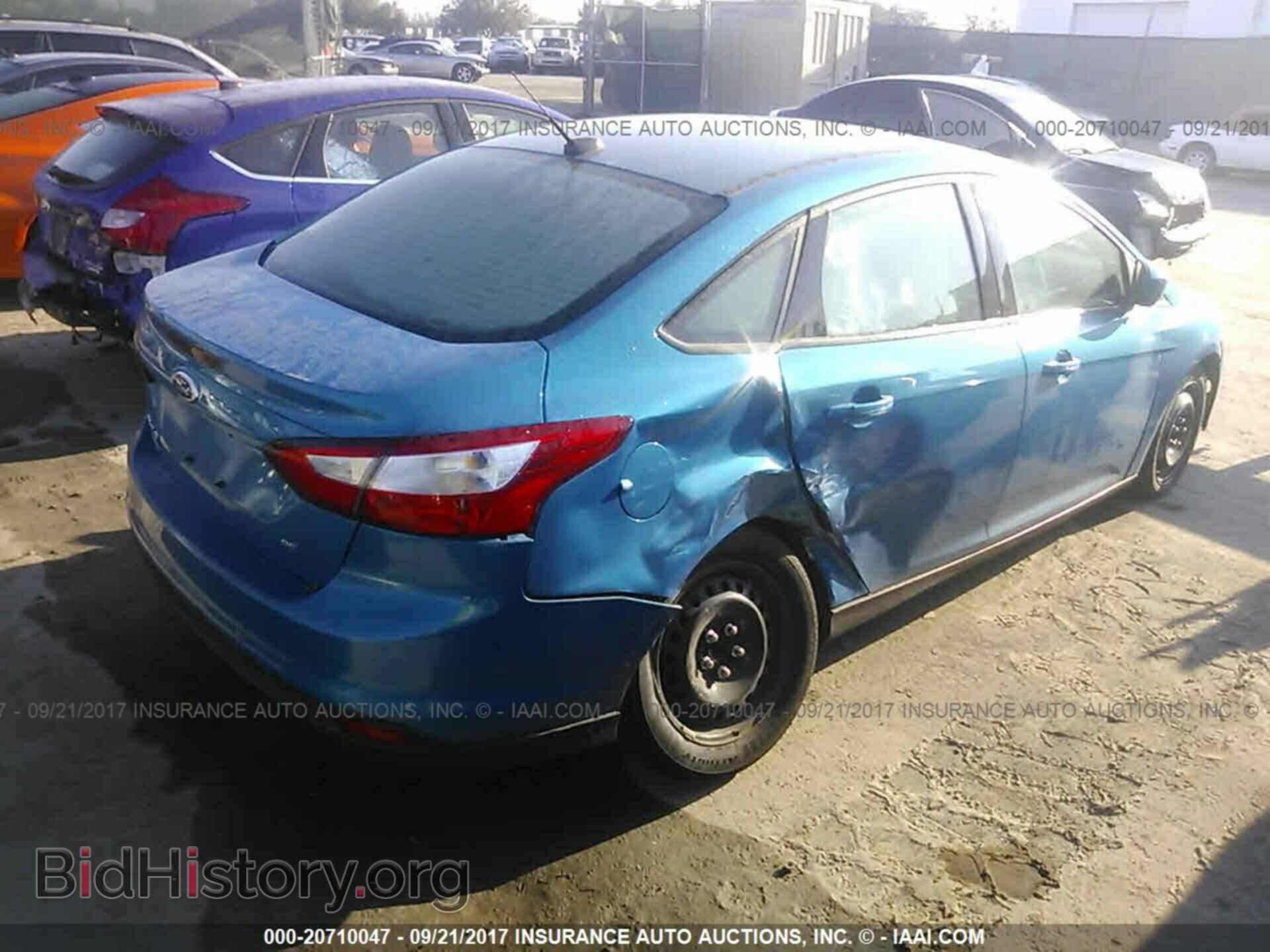 2012 Ford Focus - VIN: 1FAHP3F2XCL224927 - Photo 4