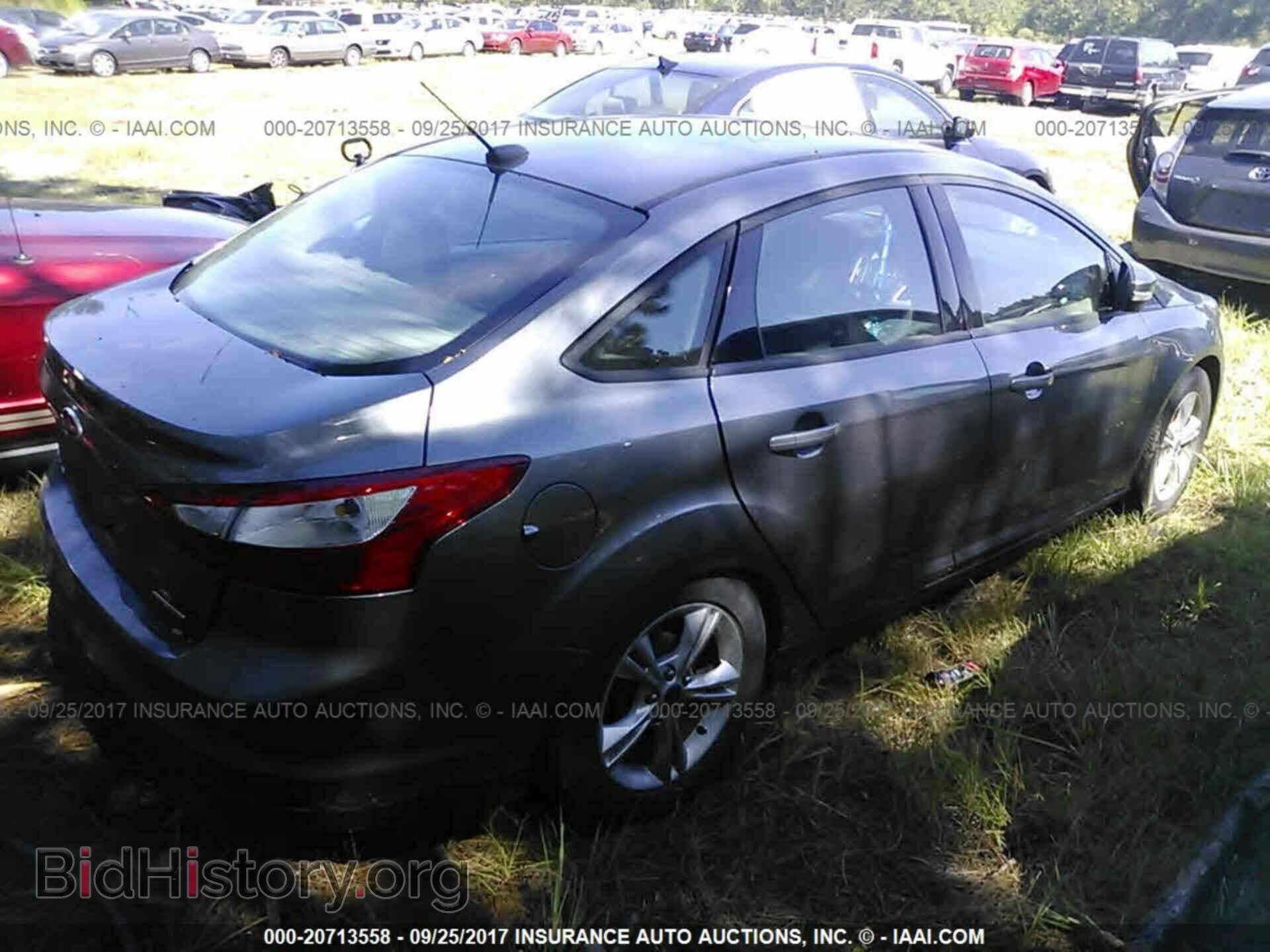 2014 Ford Focus - VIN: 1FADP3F25EL191157 - Photo 4