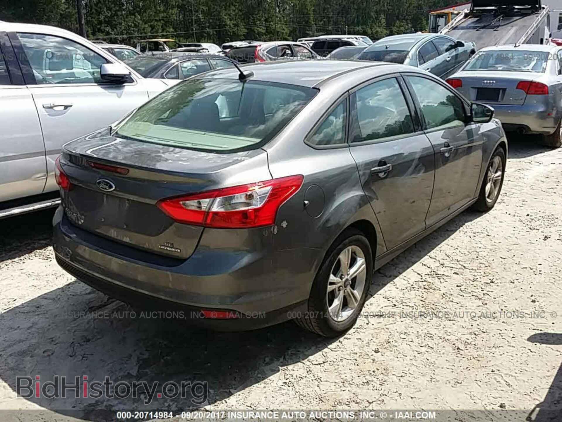 2014 Ford Focus - VIN: 1FADP3F23EL320206 - Фото 4