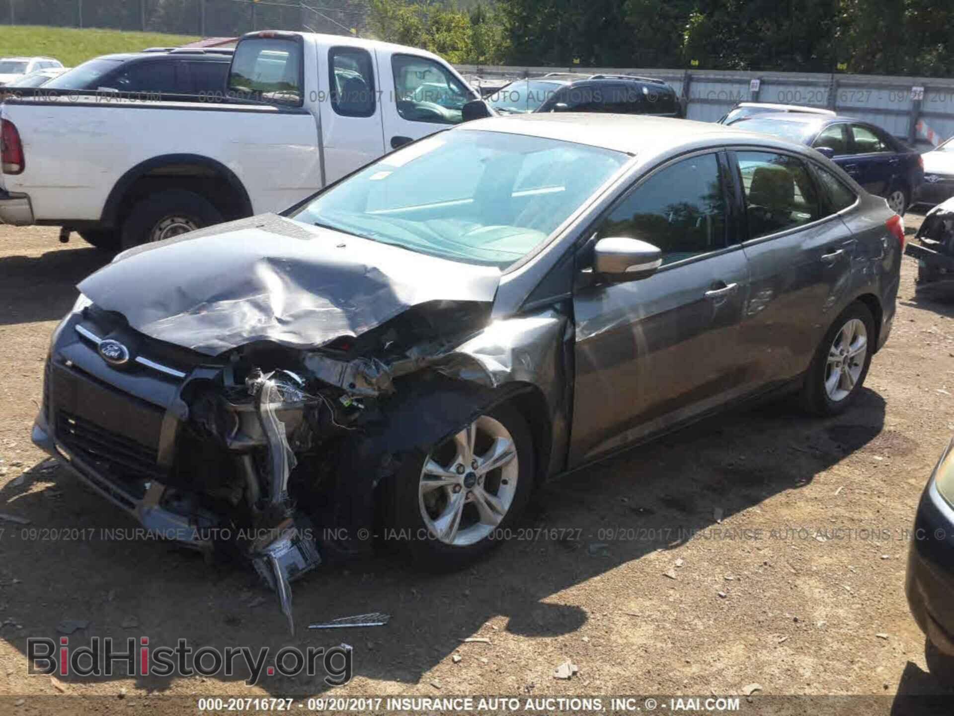 2014 Ford Focus - VIN: 1FADP3F27EL418316 - Photo 2